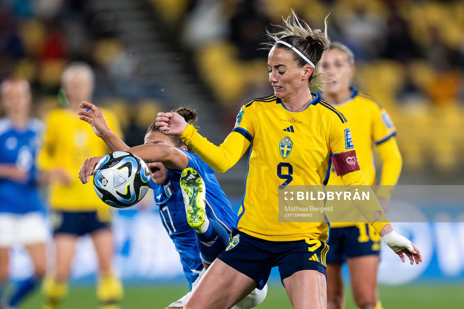 Lisa Boattin of Italy and Kosovare Asllani of Sweden