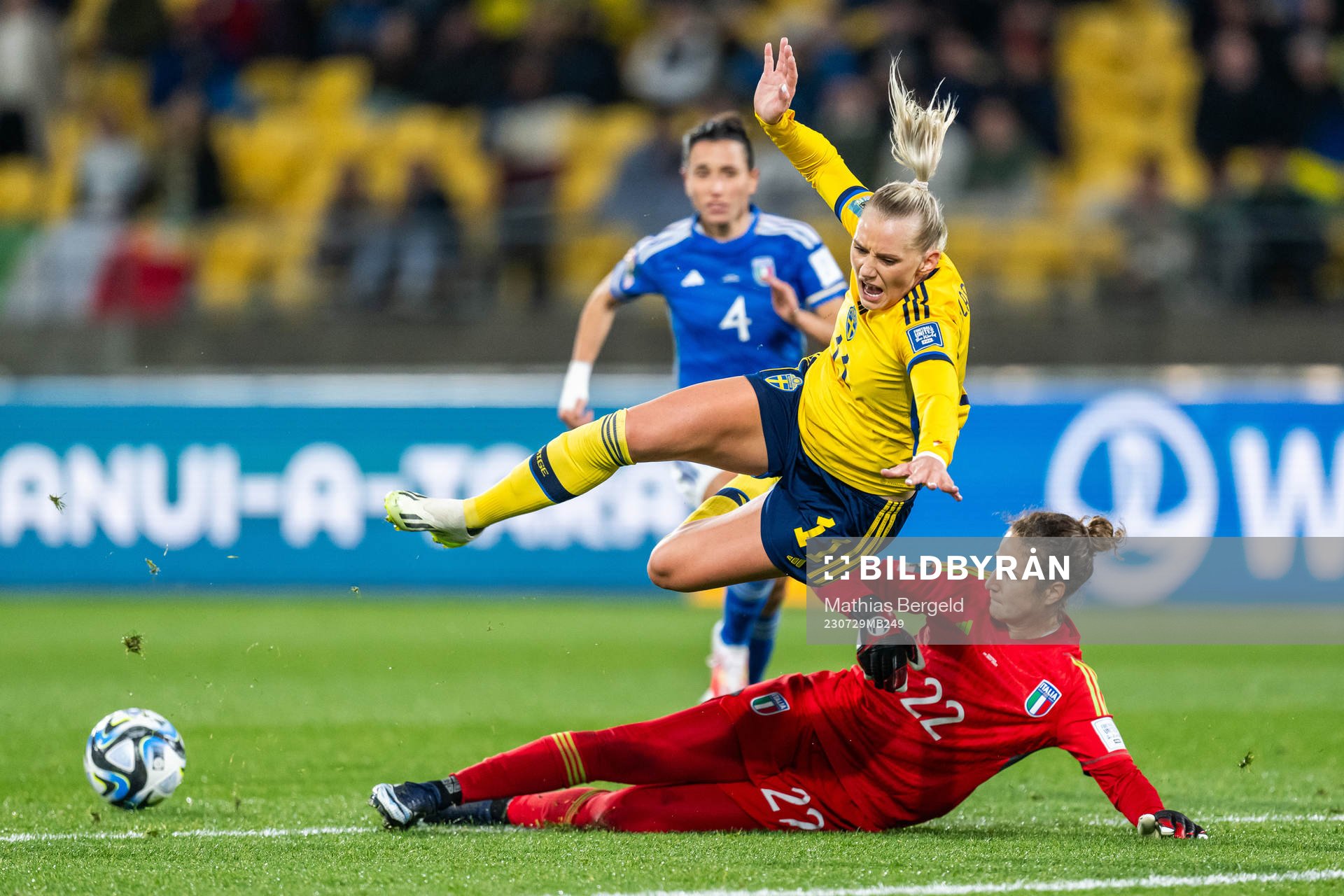 Stina Blackstenius of Sweden falls in a duel with