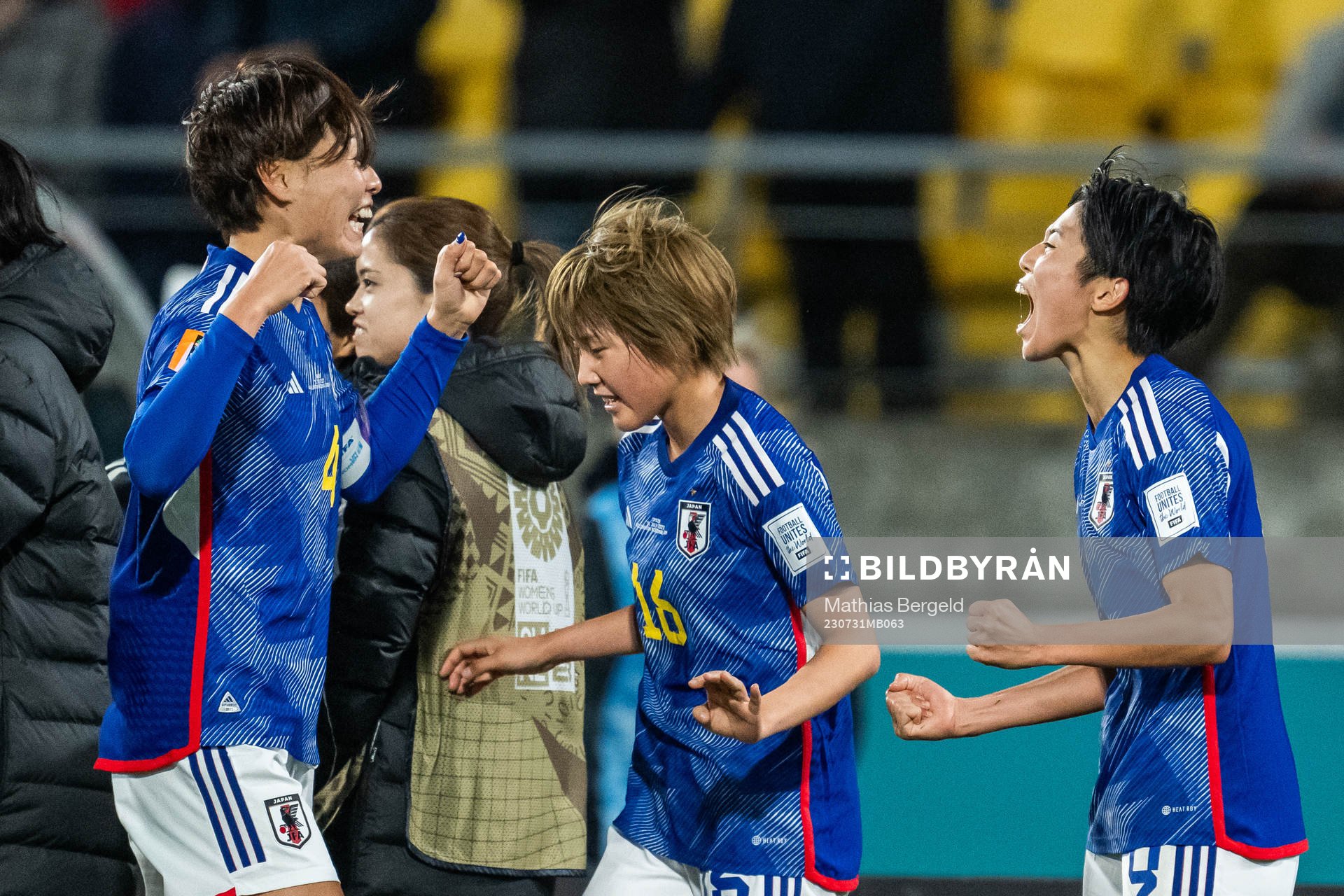 Saki Kumagai and Honoka Hayashi celebrate with Riko Ueki of