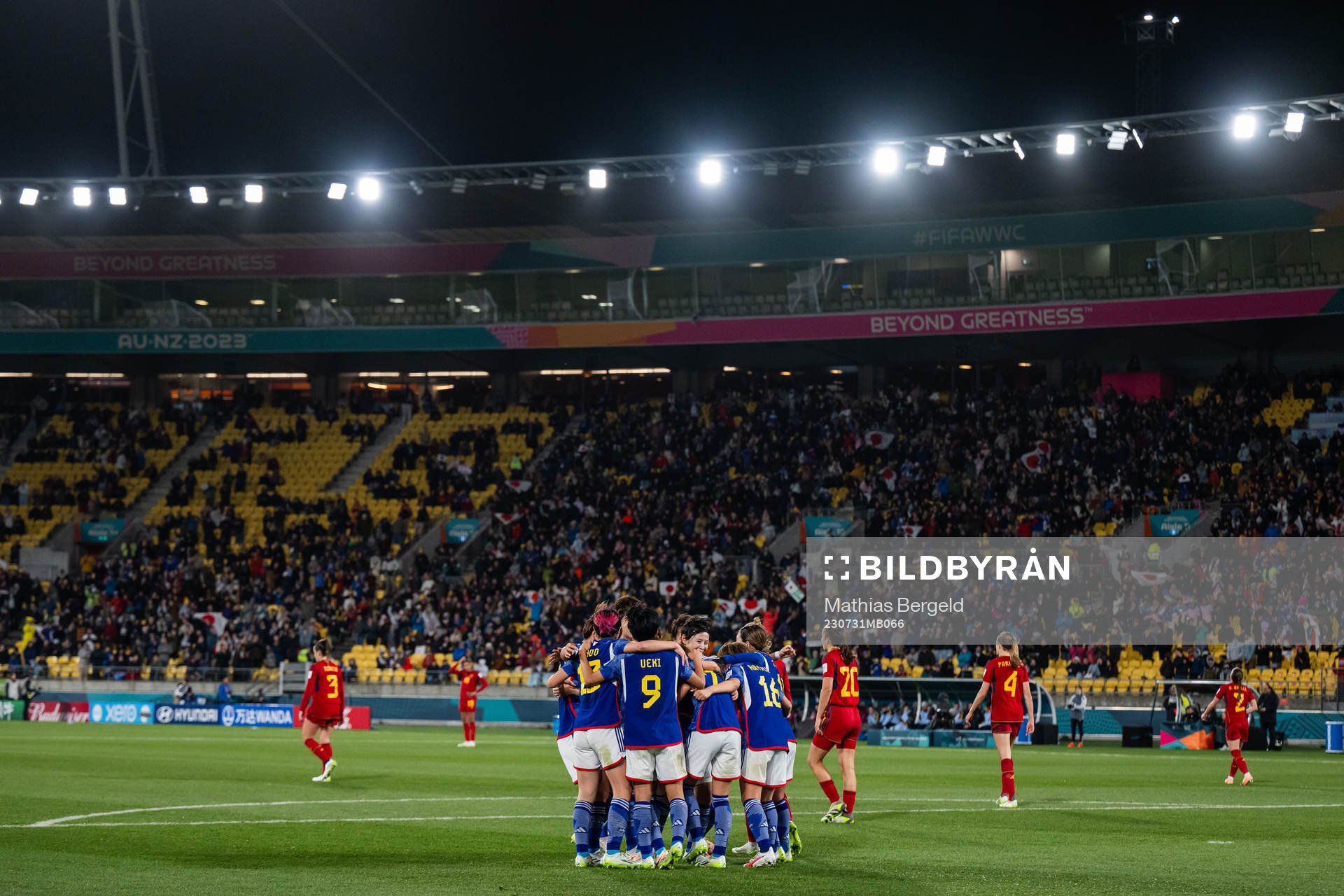Hinata Miyazawa of Japan celebrates with team mates