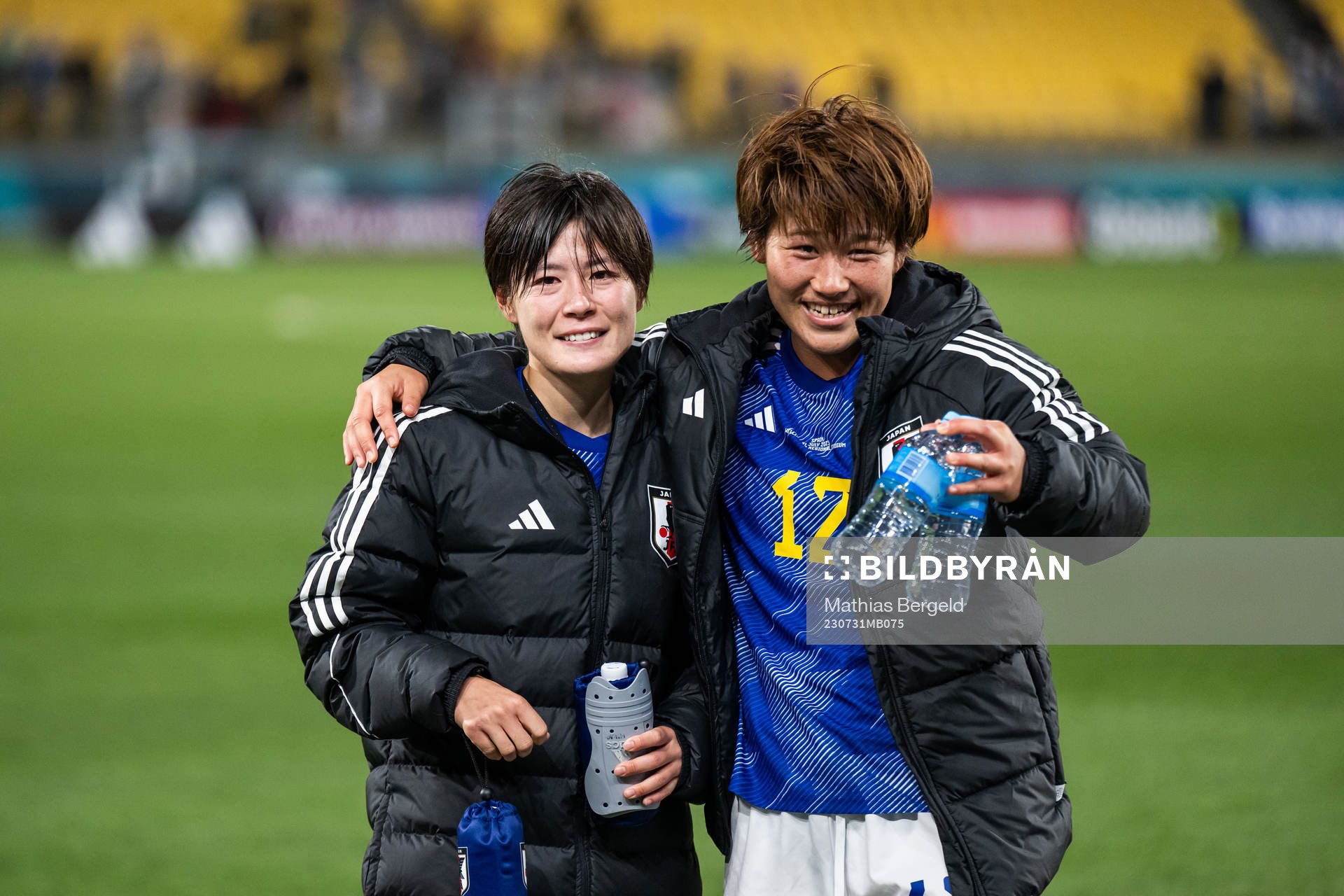Hikaru Naomoto and Hana Takahashi of Japan celebrates