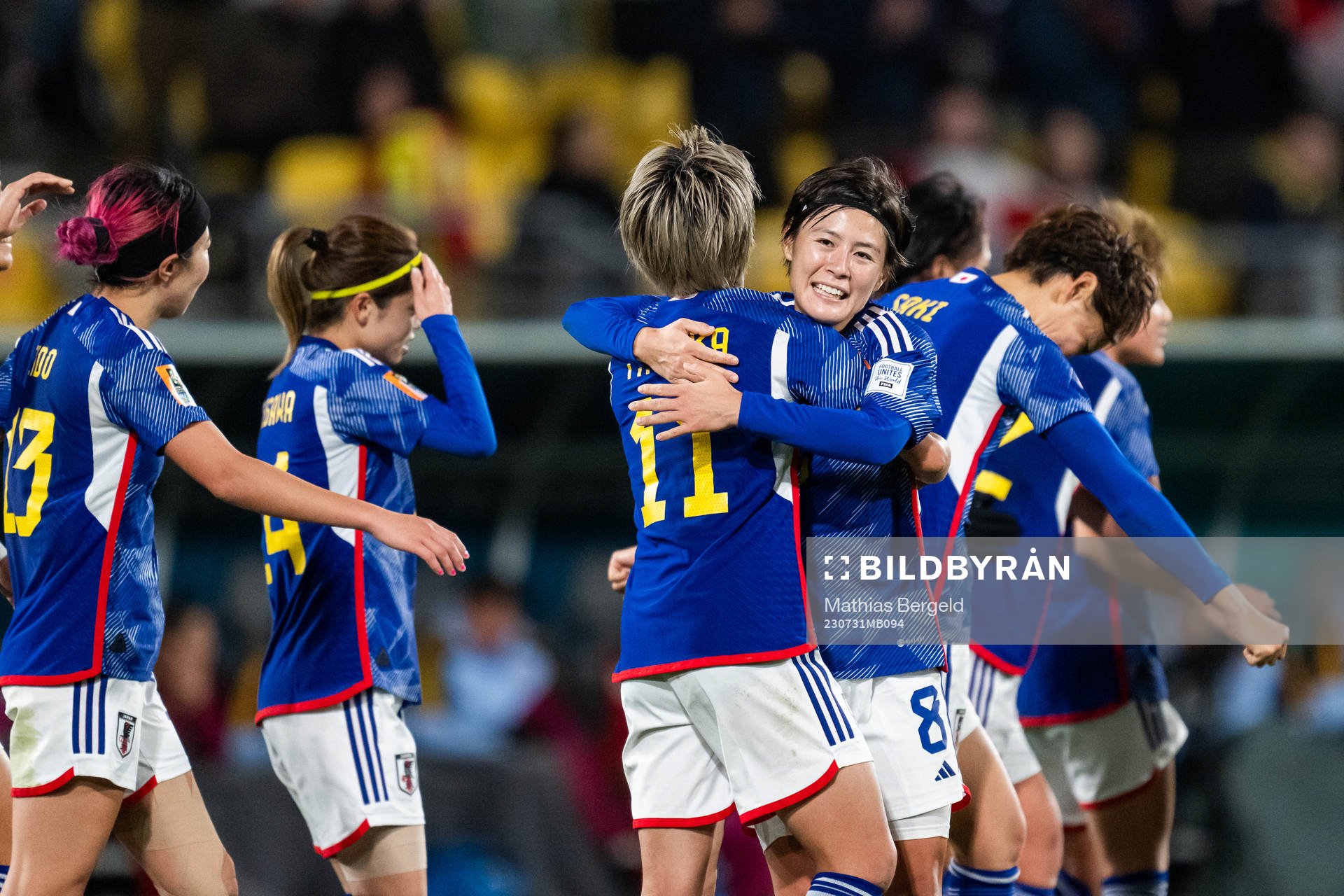 Mina Tanaka of Japan celebrates with Hikaru Naomoto