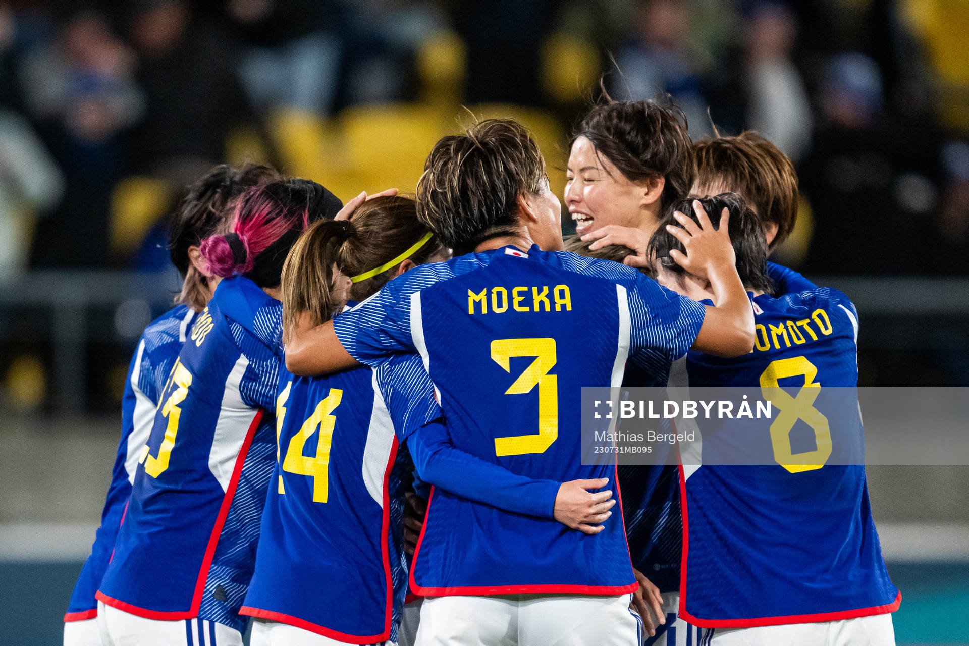 Mina Tanaka of Japan celebrates with team mates