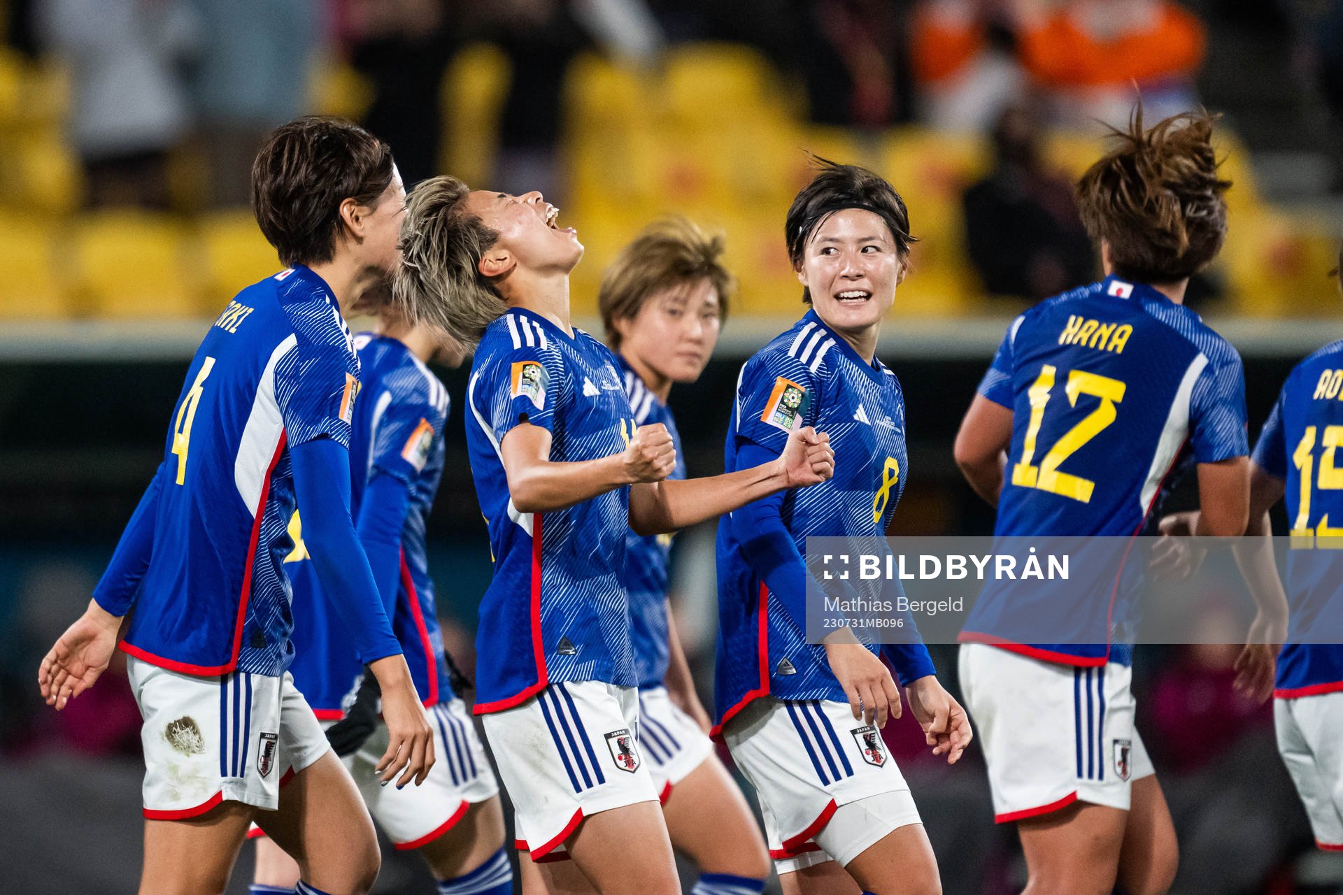 Mina Tanaka of Japan celebrates with team mates