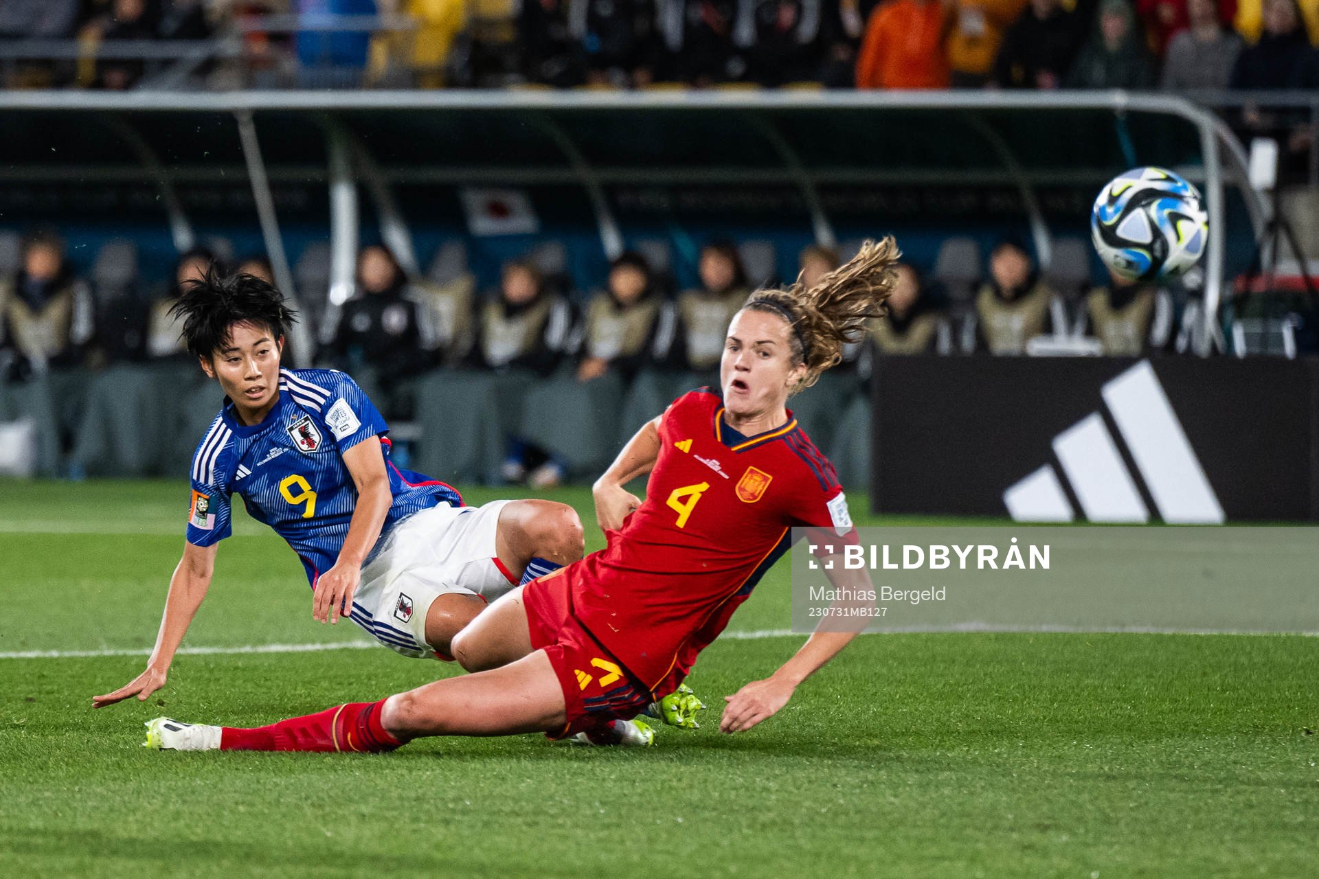 Riko Ueki of Japan scores 2-0 competing with Irene Paredes
