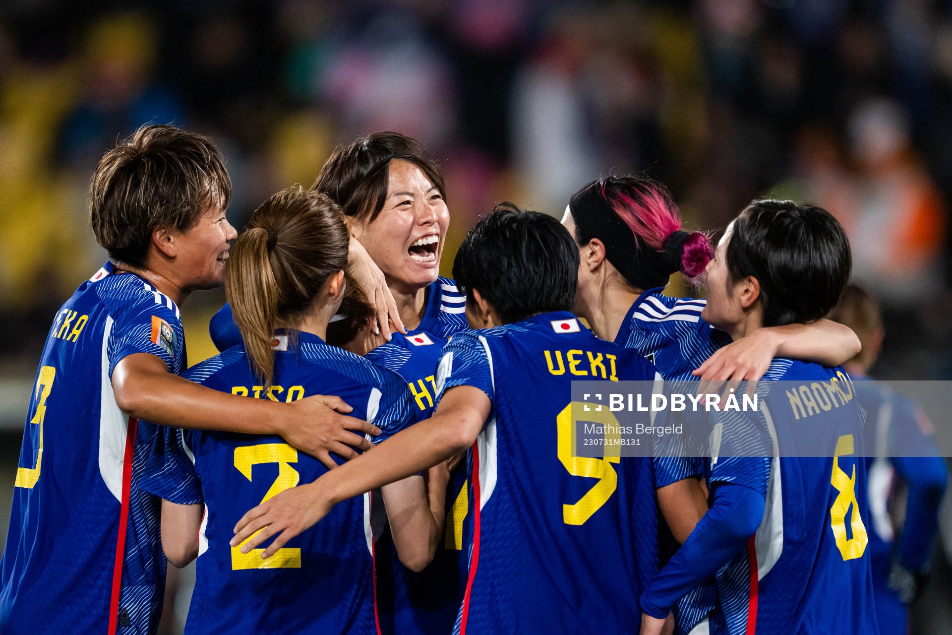 Hinata Miyazawa of Japan celebrates with team mates
