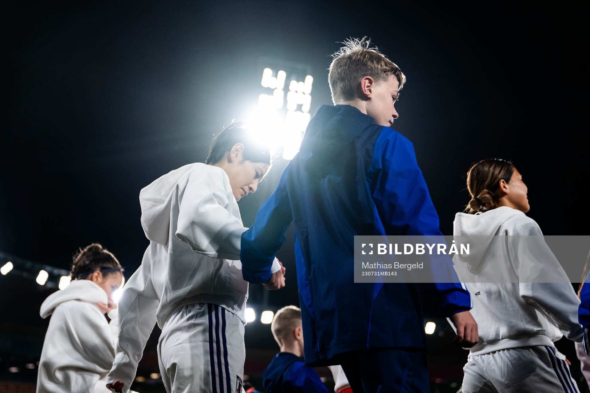 Hikaru Naomoto of Japan enters the pitch