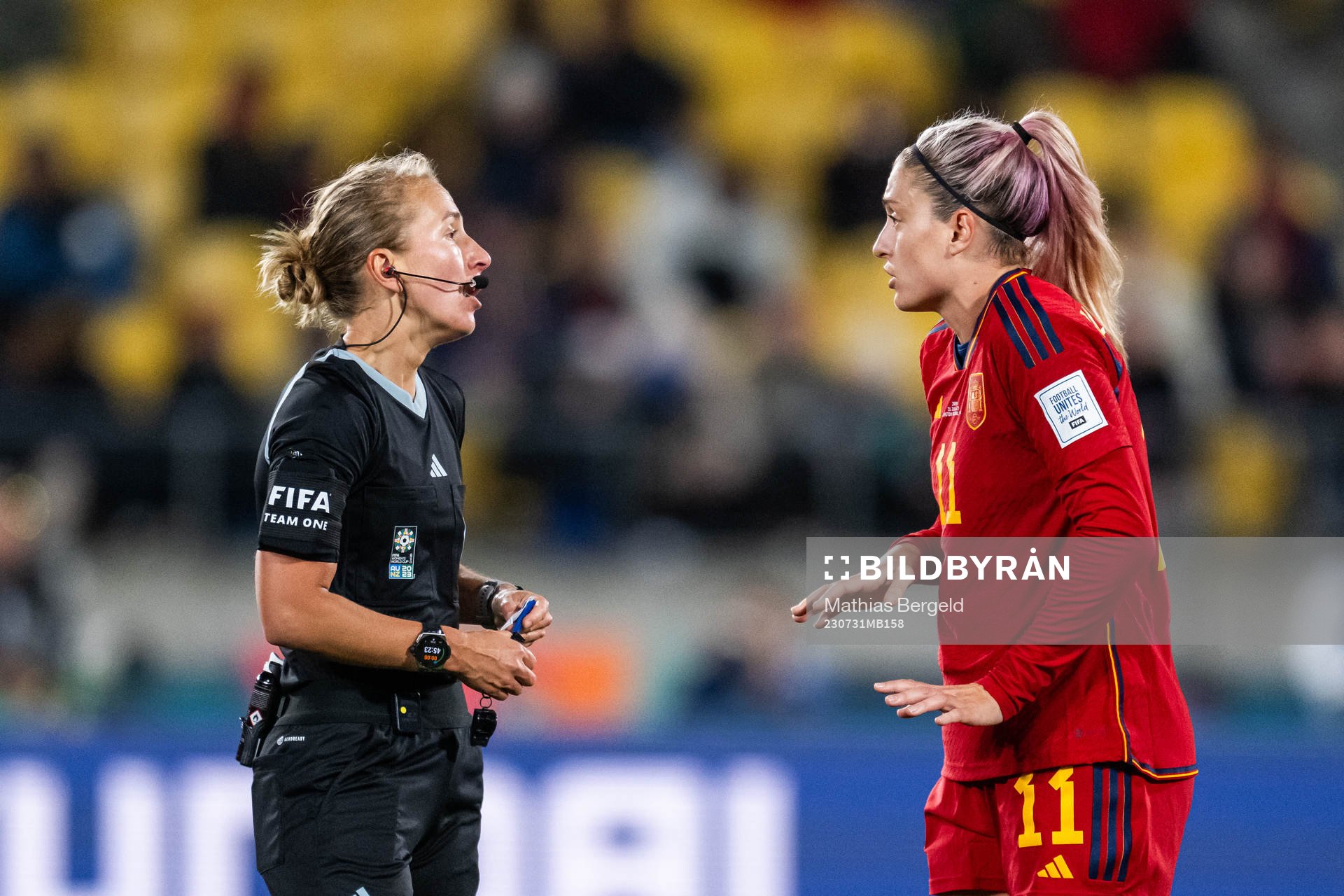 Referee Ekaterina Koroleva and Alexia Putellas of Spain