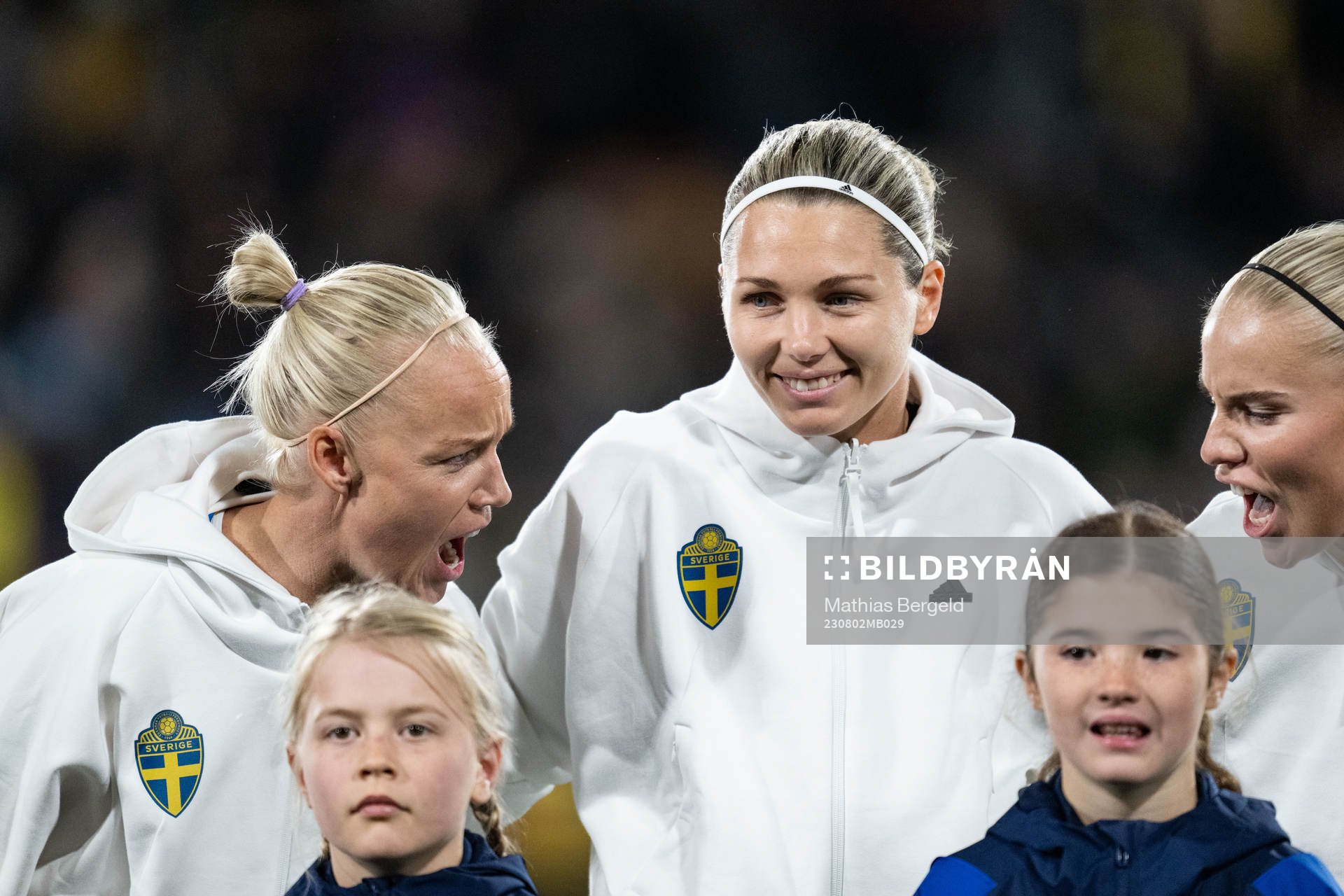 Caroline Seger and goalkeeper Jennifer Falk of Sweden