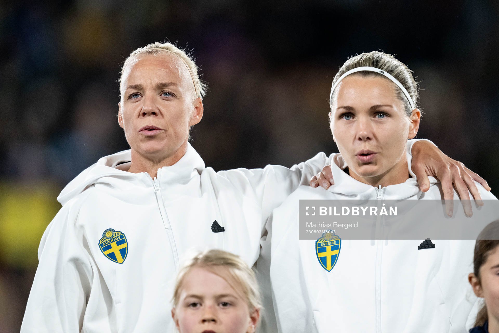 Caroline Seger and goalkeeper Jennifer Falk of Sweden