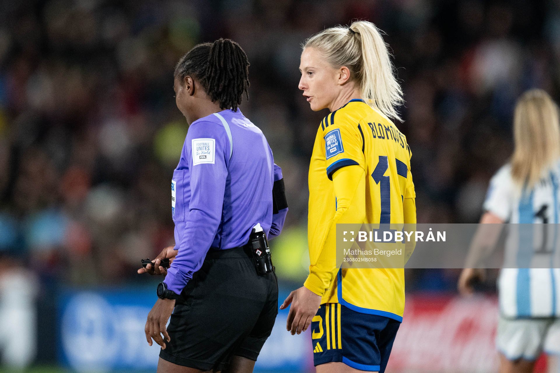 Rebecka Blomqvist of Sweden in discussion with  referee