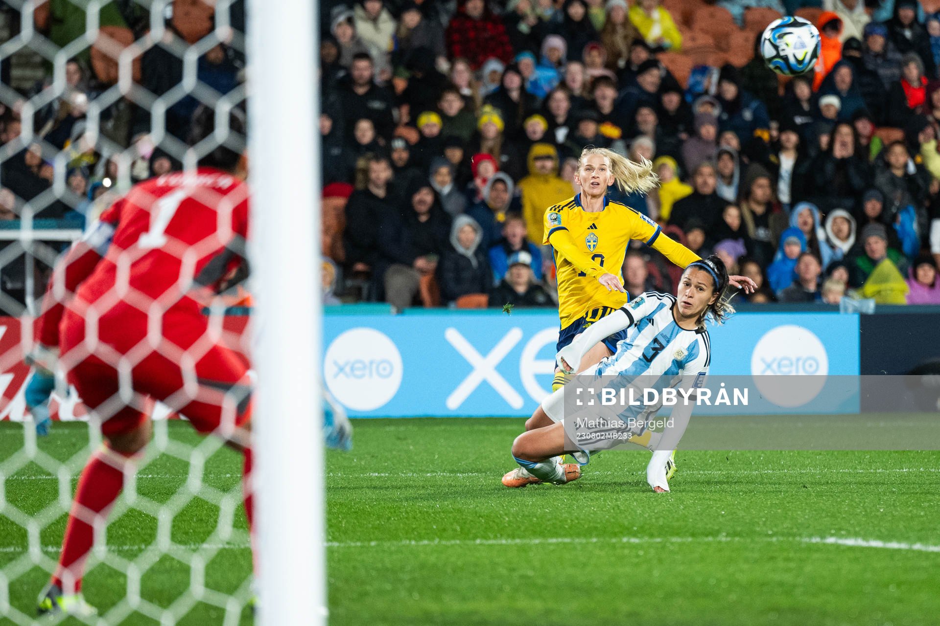 Sofia Jakobsson of Sweden passes past Eliana Stabile of