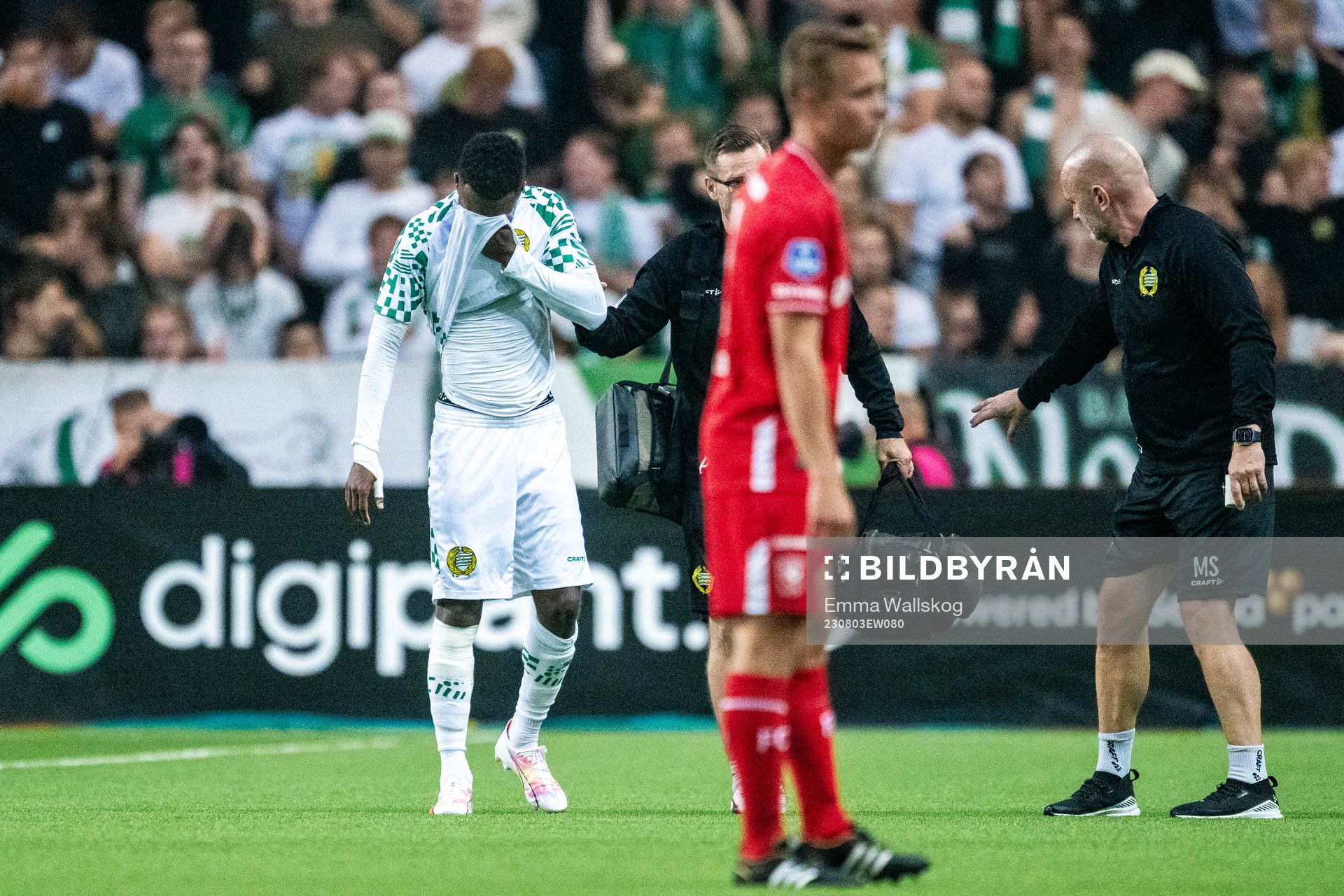 Shaquille Pinas of Hammarby leaves the pitch injured
