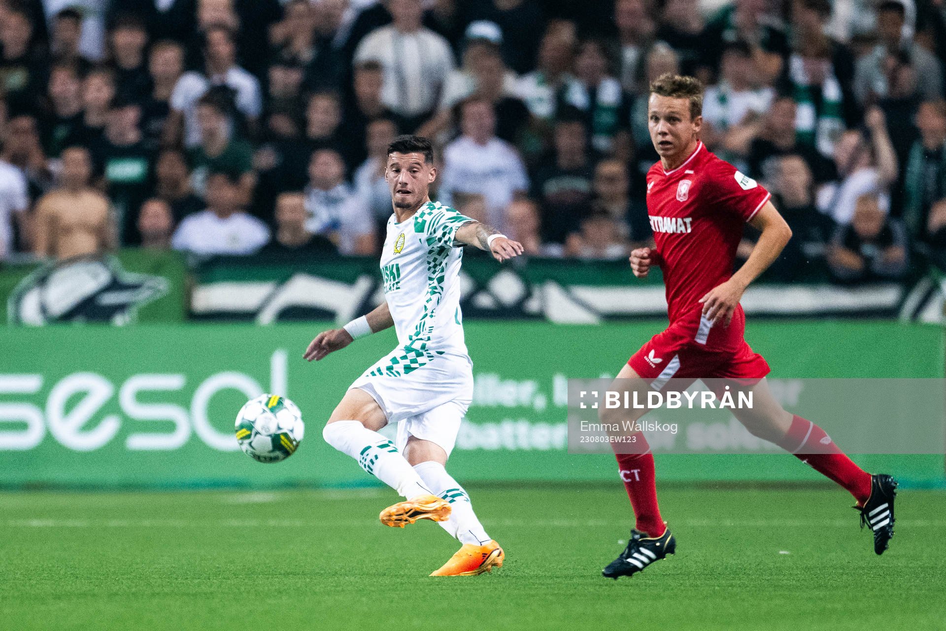 Viktor Djukanovic of Hammarby and Mathias Kjølo of Twente