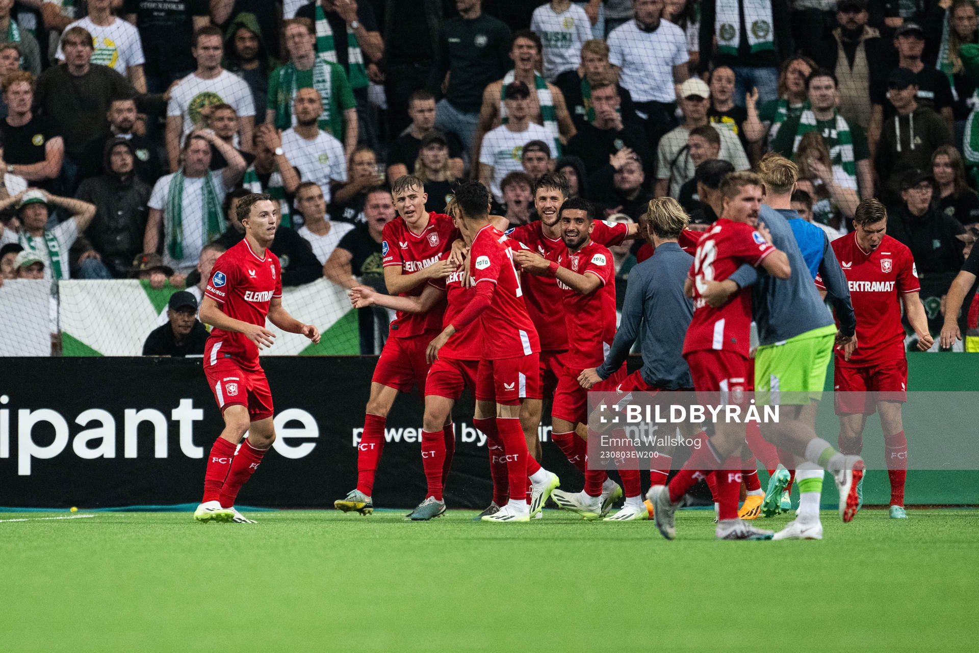 Players of Twente celebrate