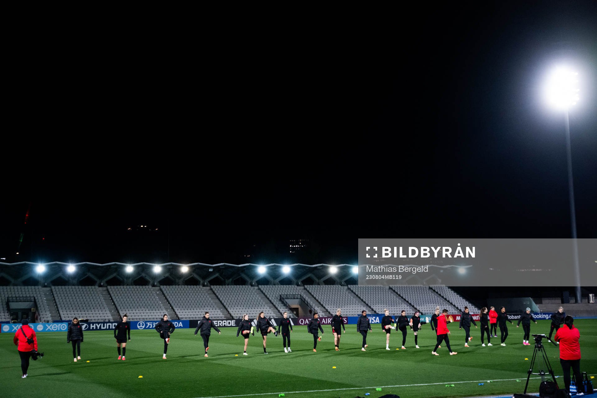 Players warm up at a training session with the women's