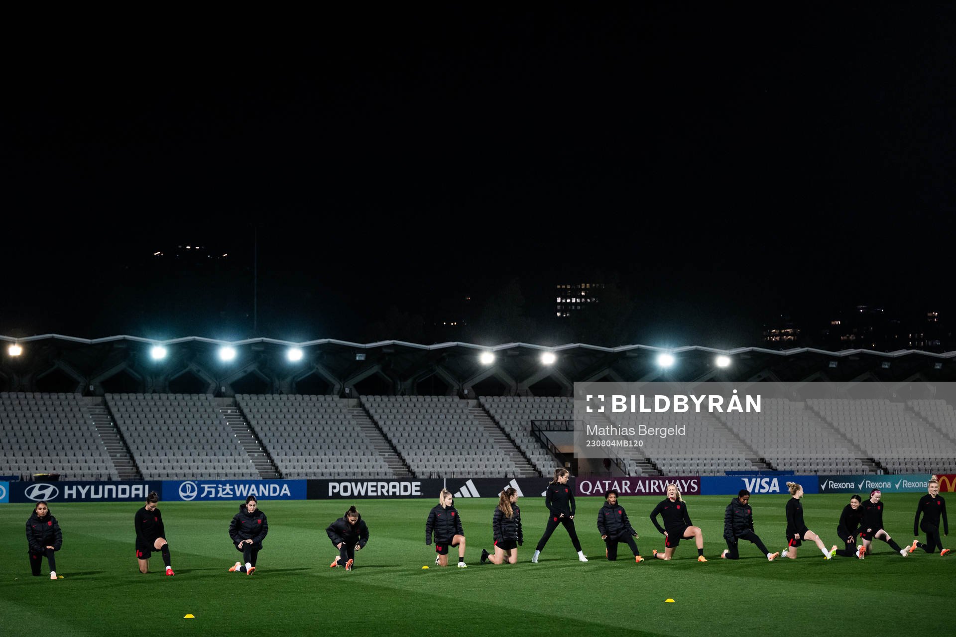 Players warm up at a training session with the women's