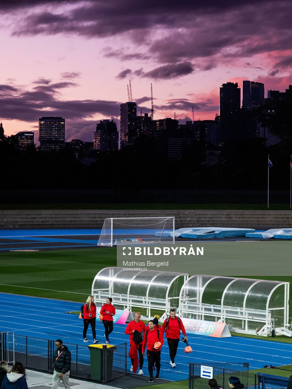 Staff arrive at a training session with the women's