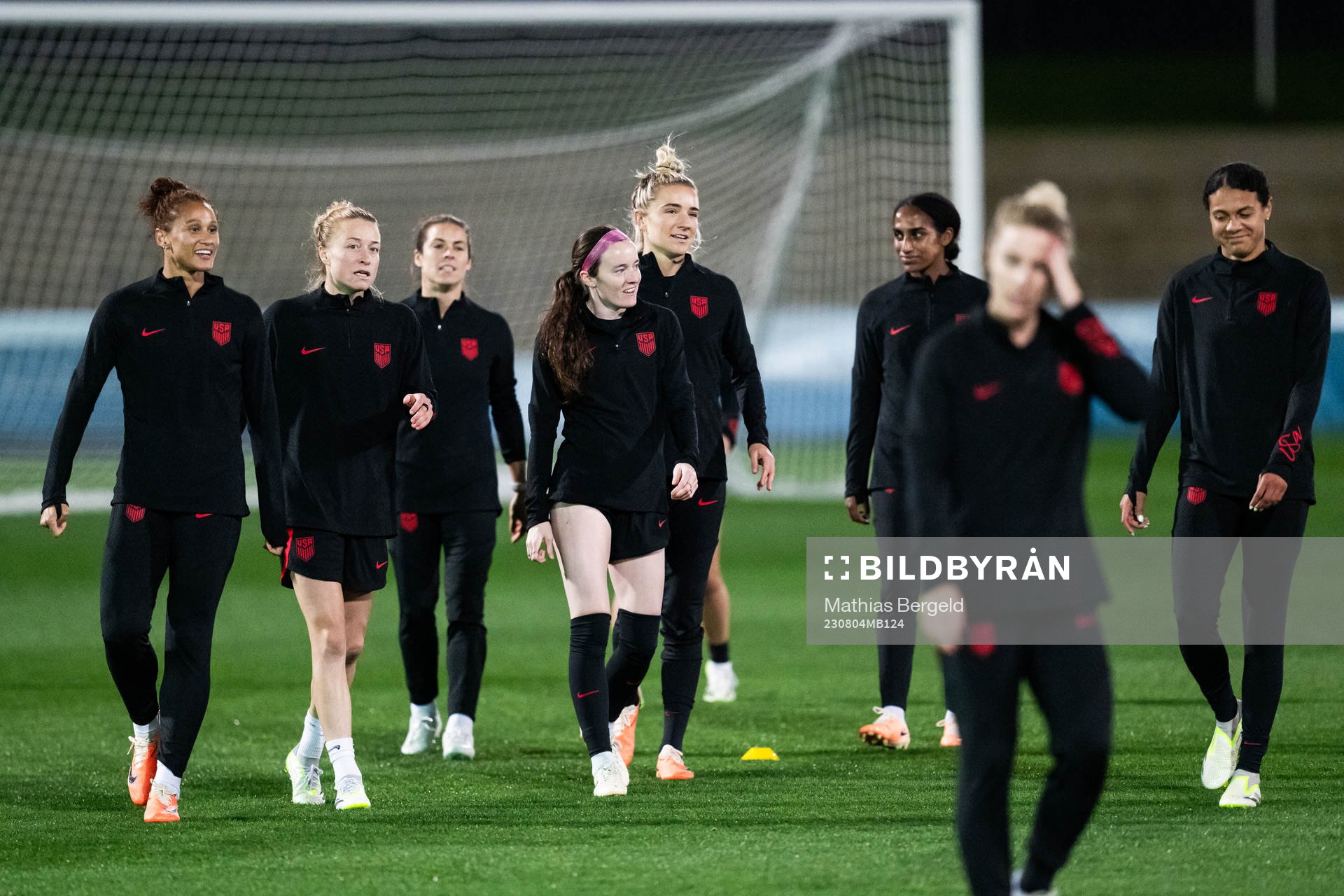 Rose Lavelle (middle) with team mates at a training session