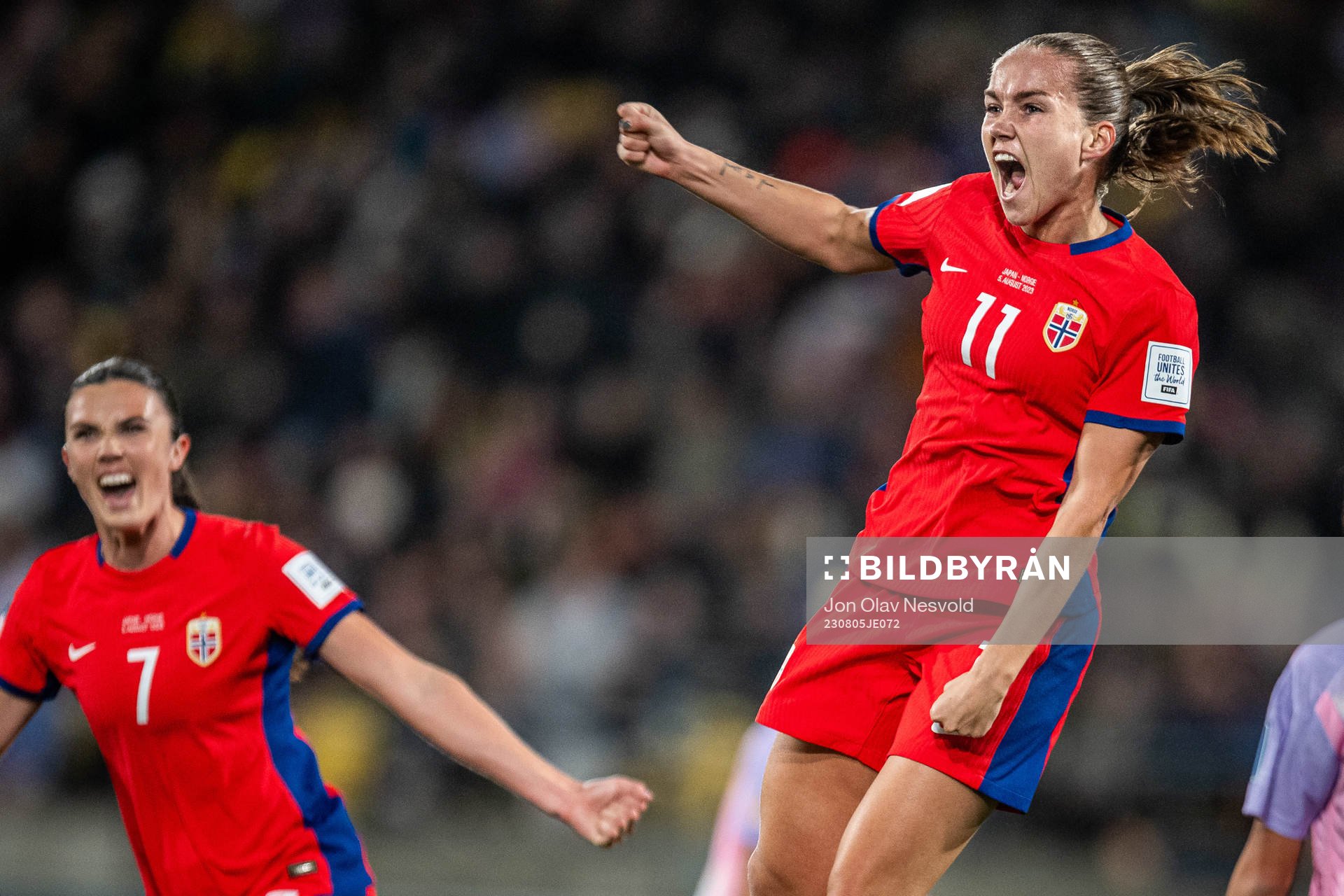 Ingrid Syrstad Engen and Guro Reiten of Norway celebrate