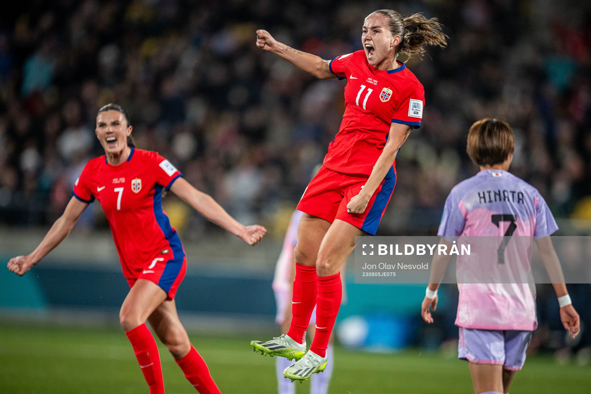 Ingrid Syrstad Engen and Guro Reiten of Norway celebrate