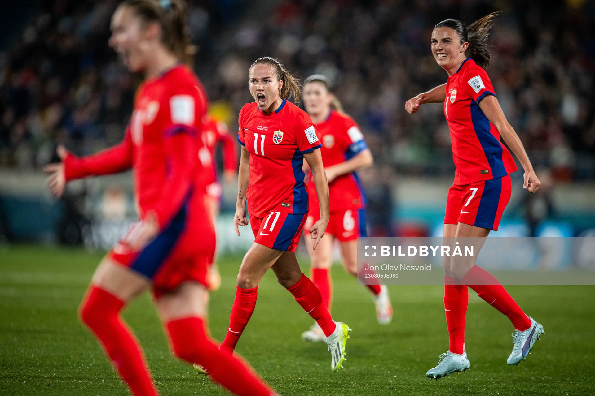 Ingrid Syrstad Engen and Guro Reiten of Norway celebrates