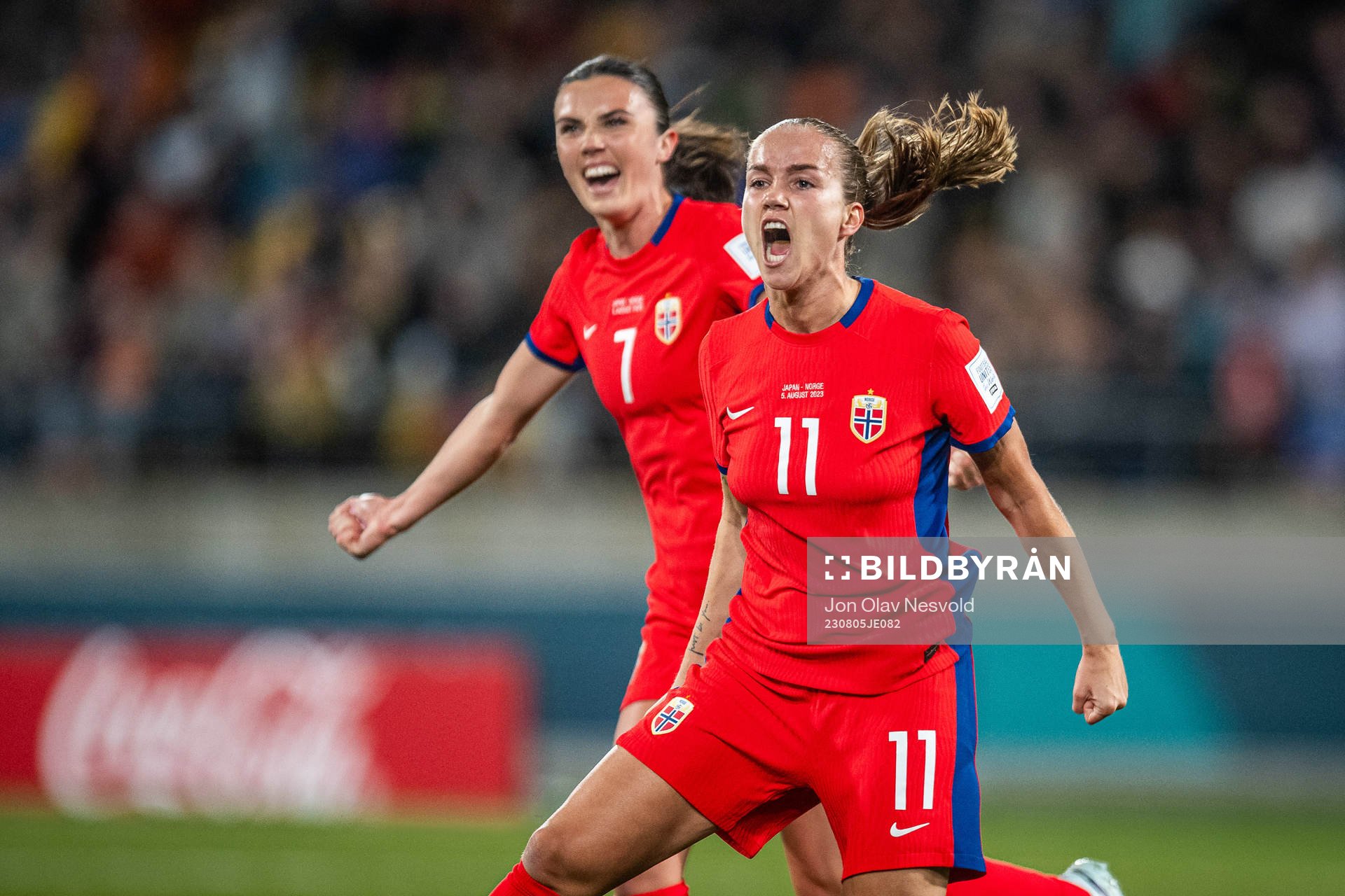 Ingrid Syrstad Engen and Guro Reiten of Norway celebrates