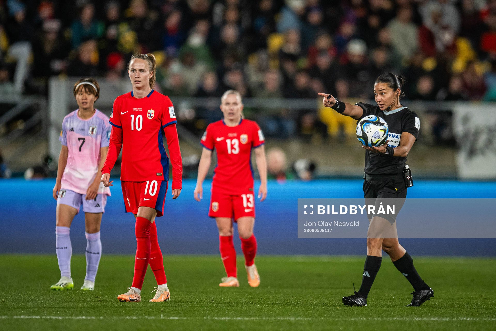 Caroline Graham Hansen of Norway and Referee Edina Alves