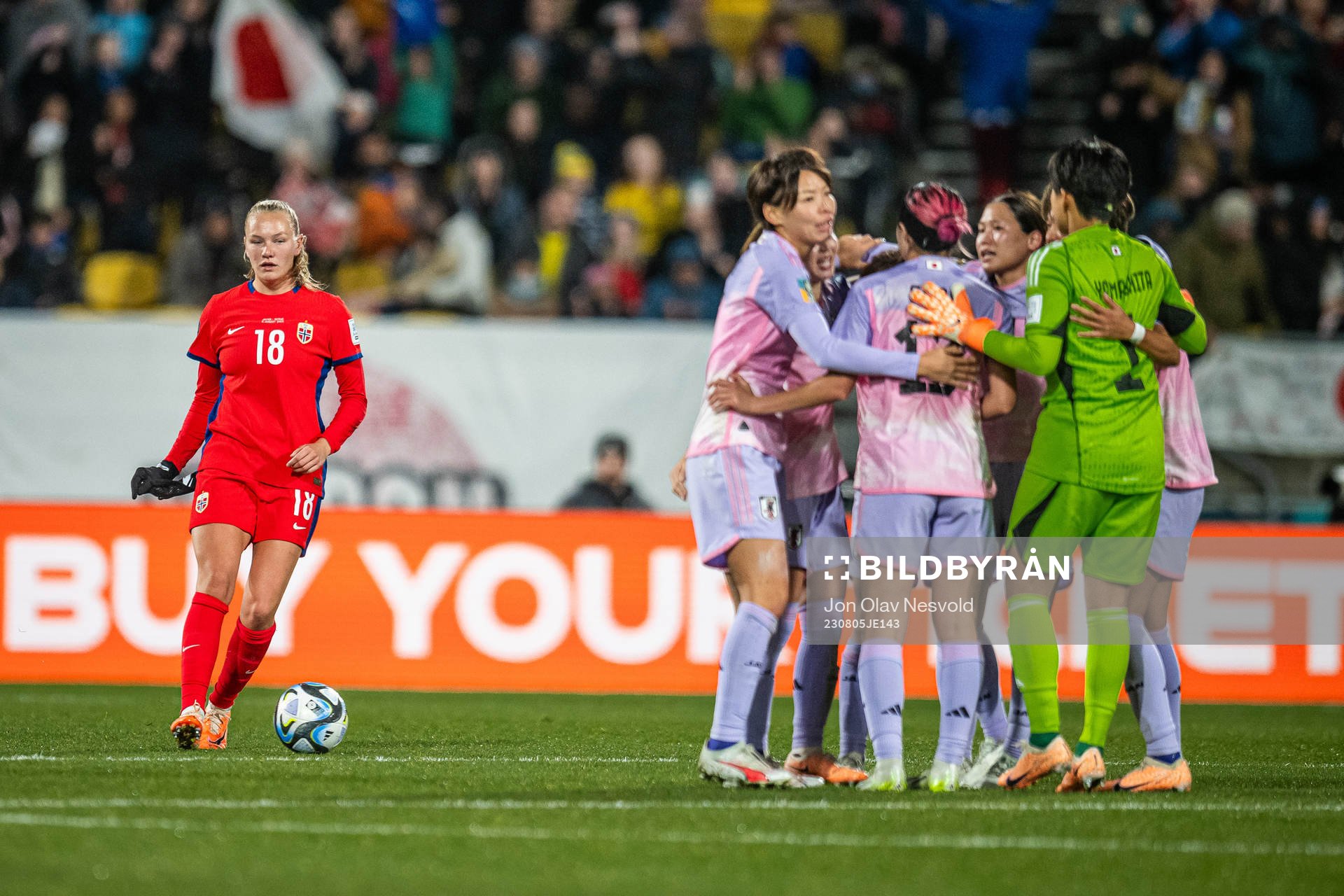 Frida Maanum of Norway looks dejected while players of