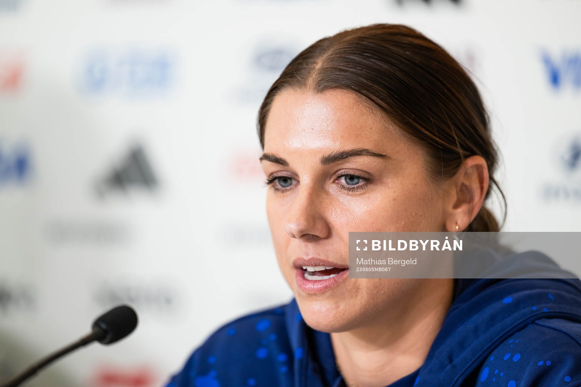 Alex Morgan at a press conference with the women's national