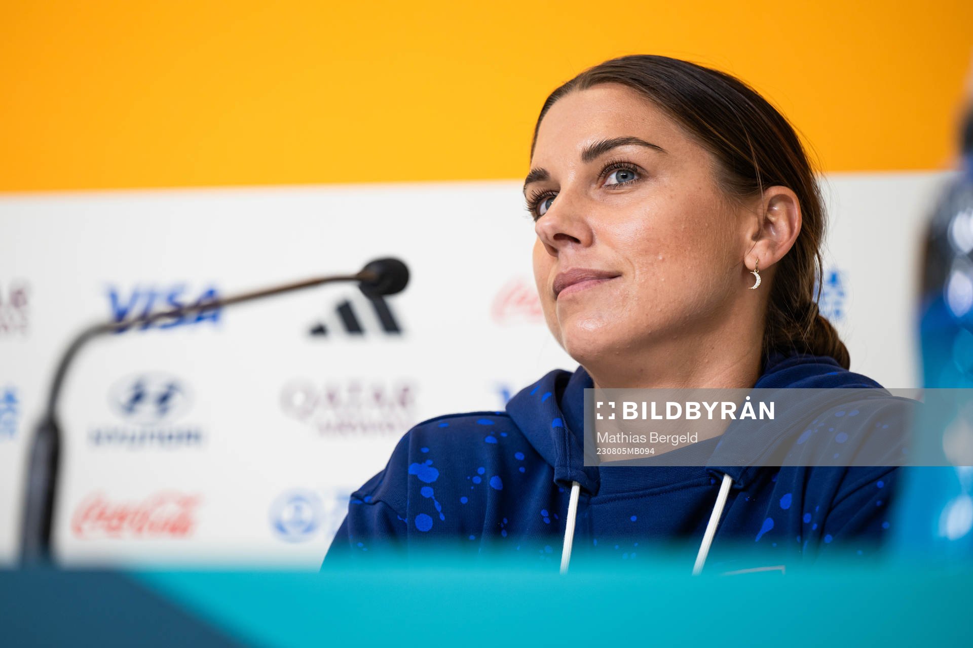 Alex Morgan at a press conference with the women's national