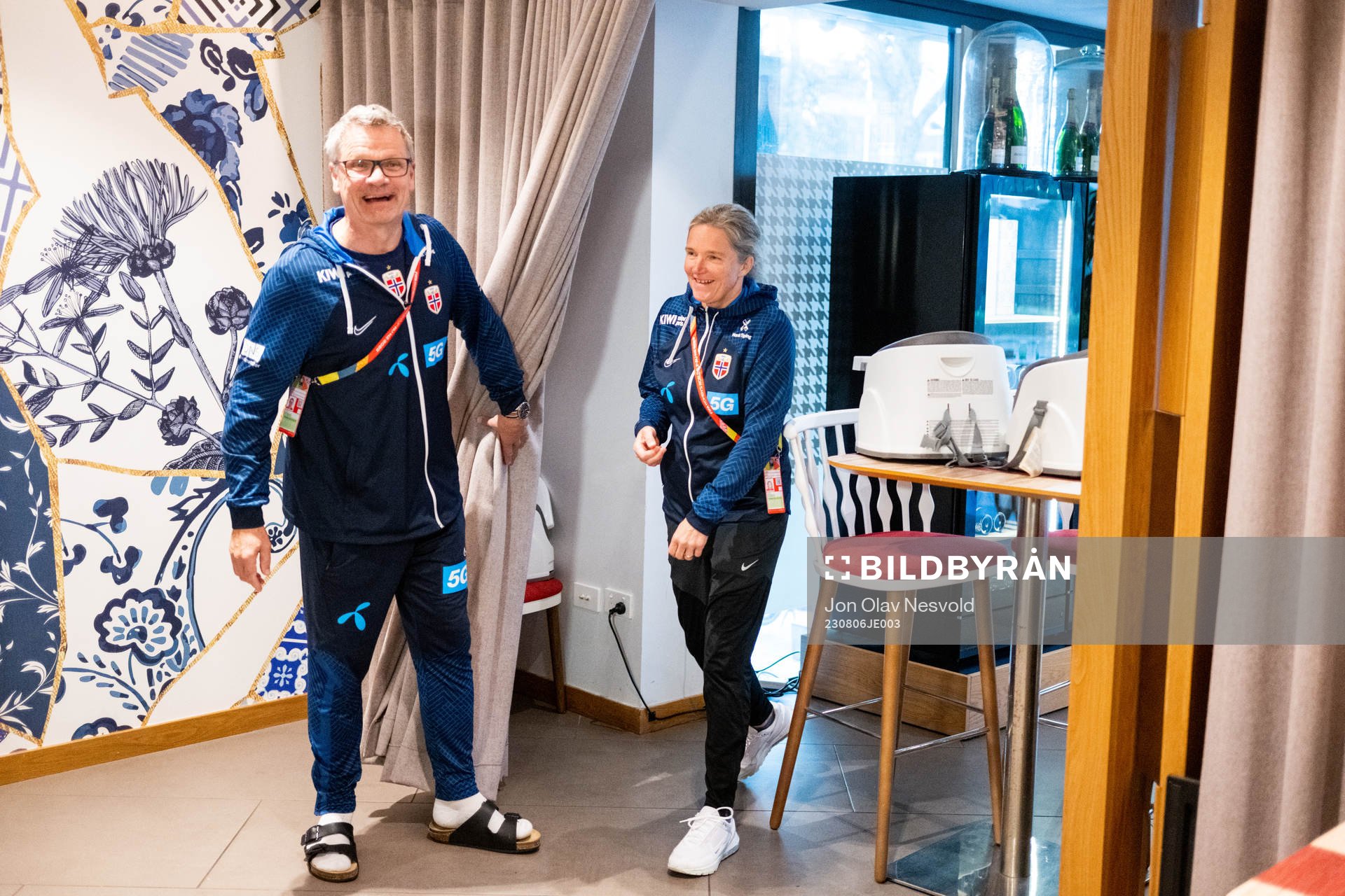 Press officer Halvor Lea and head coach Hege Riise of