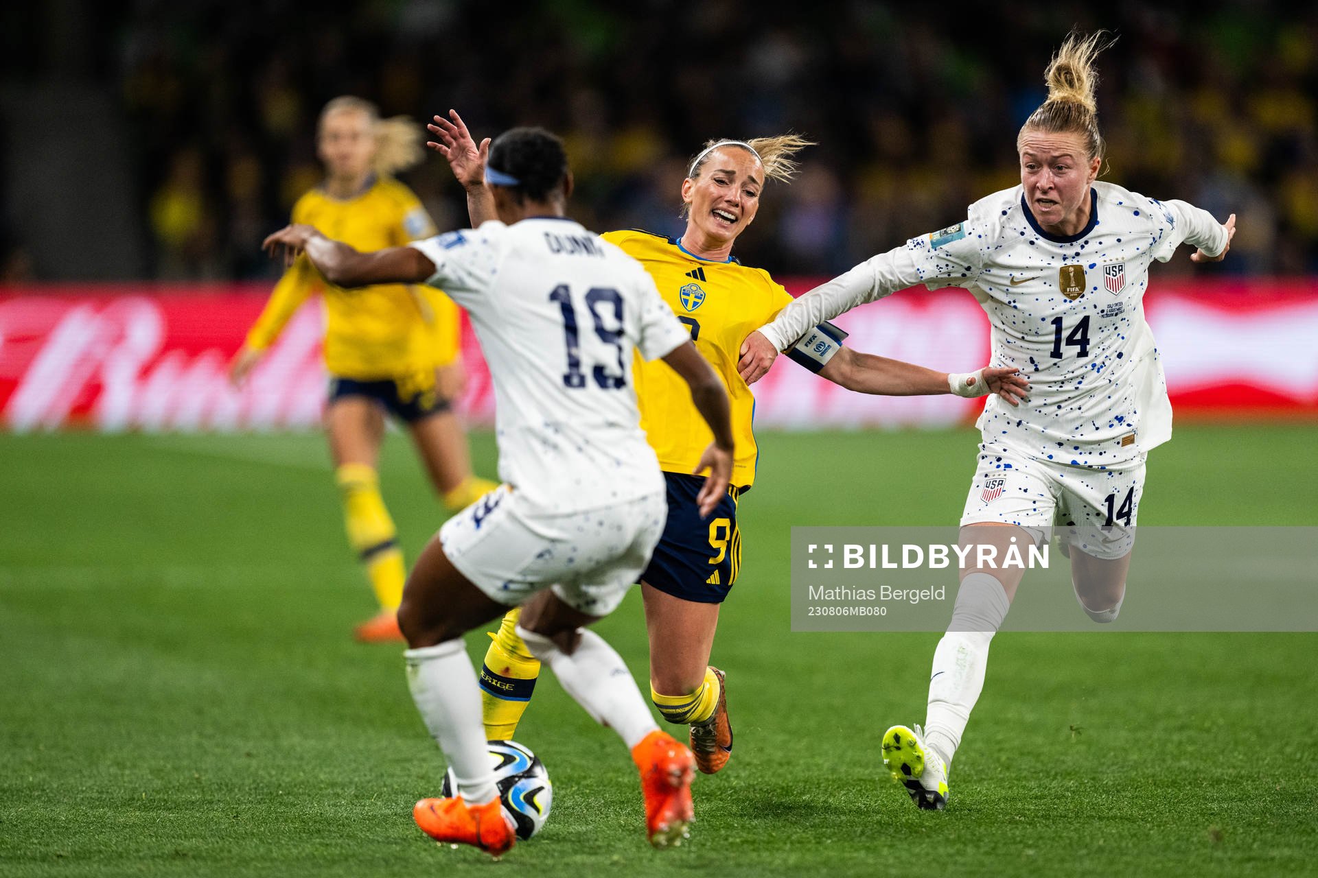 Kosovare Asllani of Sweden and Emily Sonnett of USA