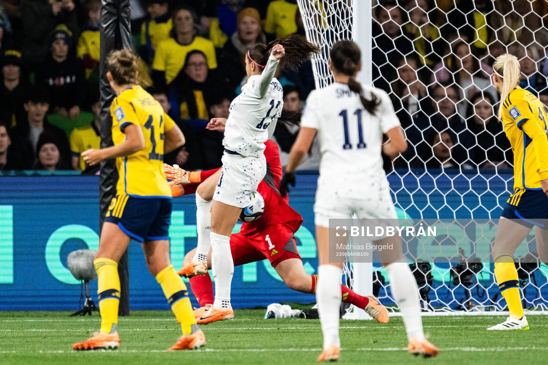 Alex Morgan of USA and goalkeeper Zecira Musovic of Sweden