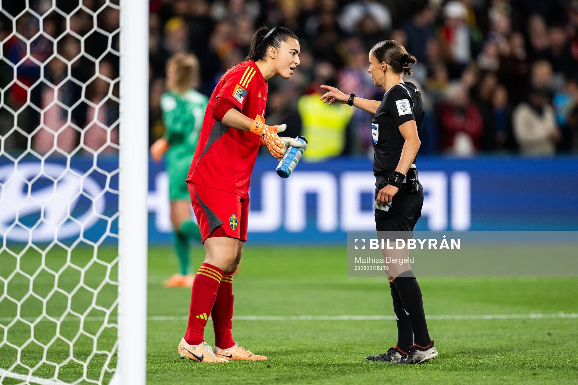 Goalkeeper Zecira Musovic of Sweden and referee Stephanie