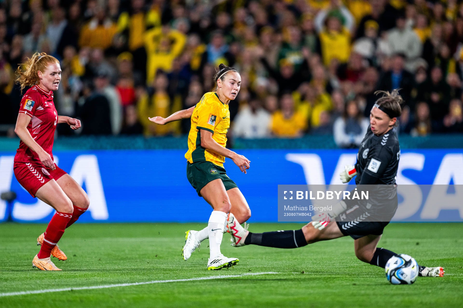 Stine Ballisager and goalkeeper Lene Christensen of Denmark