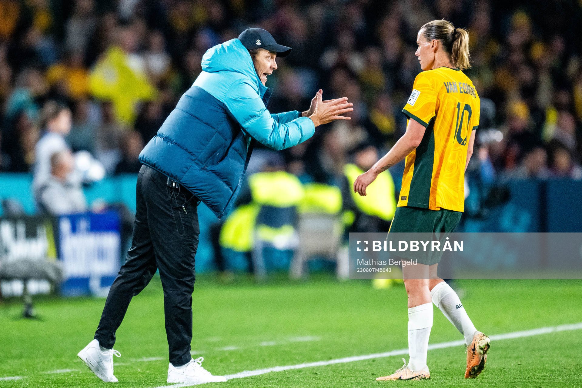Head coach Tony Gustavsson and Emily van Egmond of Australia