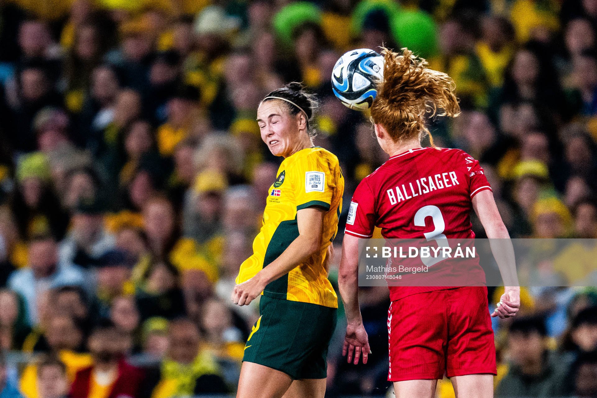 Caitlin Foord of Australia and Stine Ballisager of Denmark