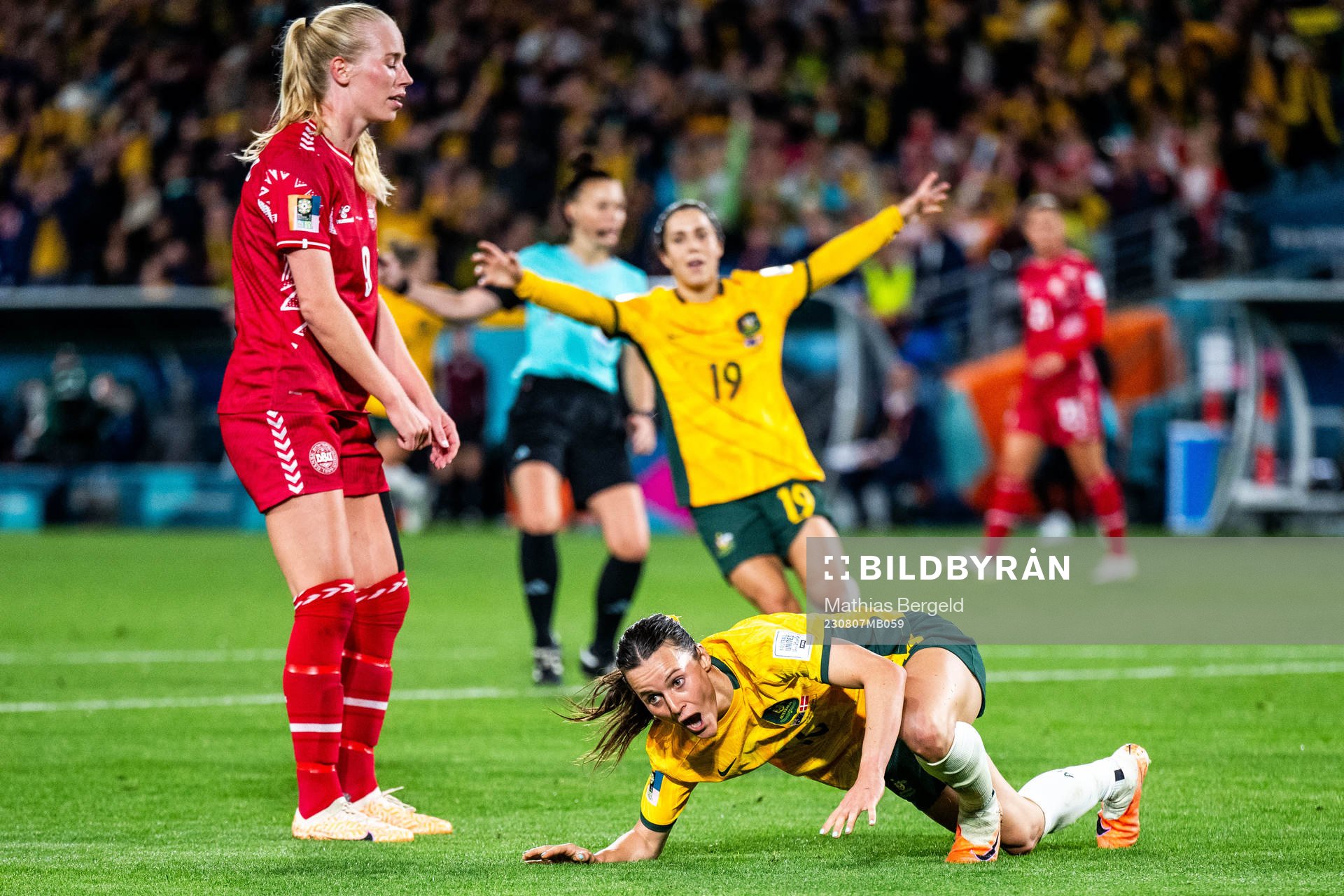 Amalie Vaansgaard of Denmark looks dejected and Hayley Raso