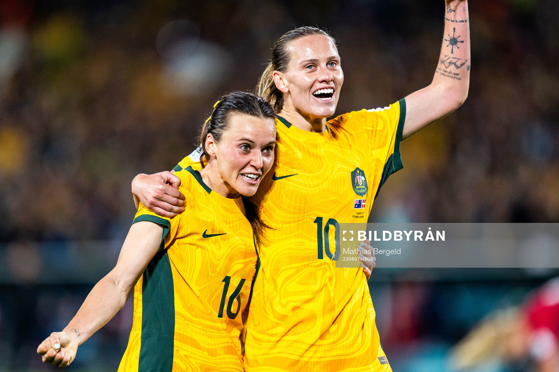 Hayley Raso and Emily van Egmond of Australia celebrates