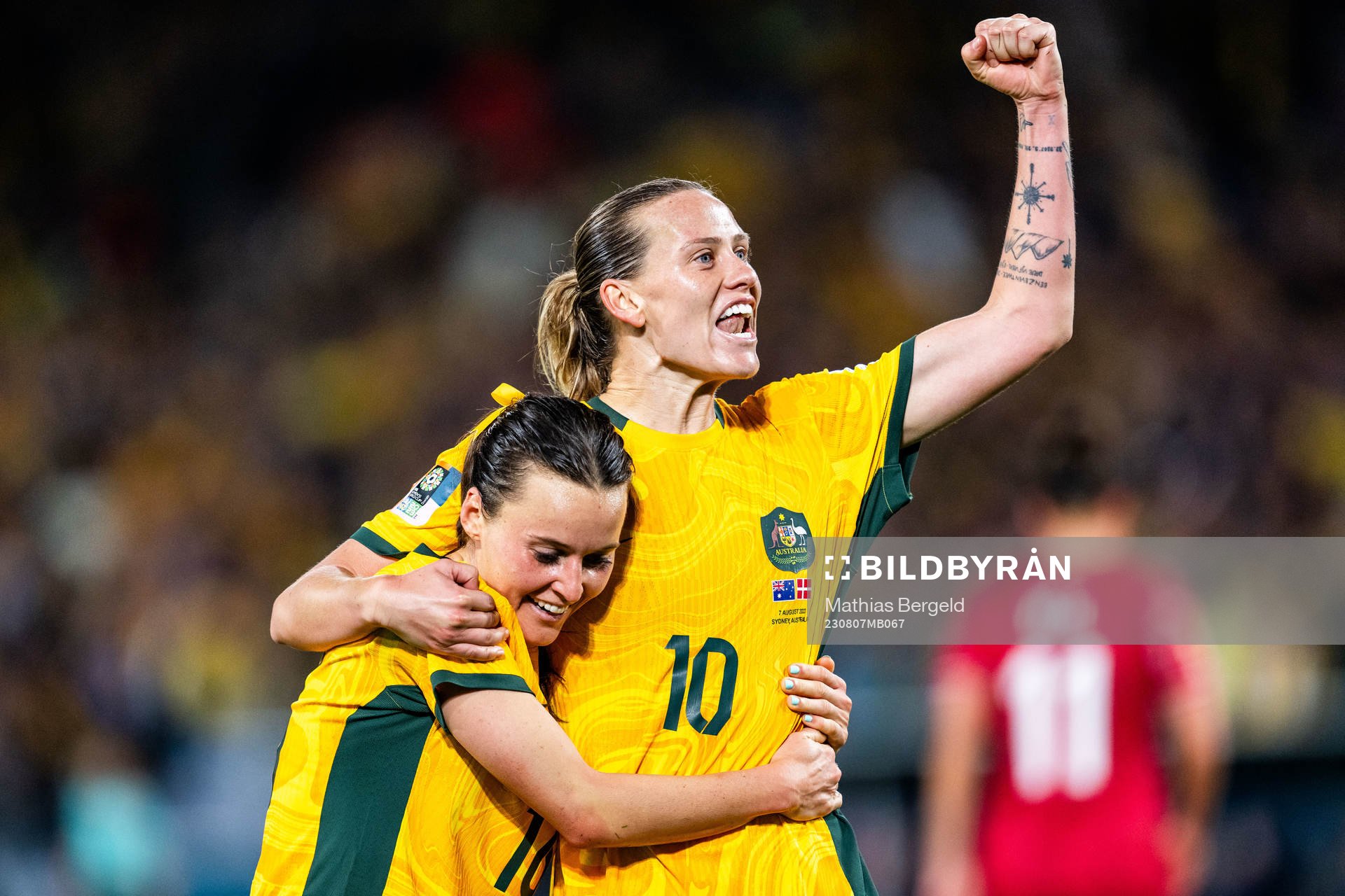 Hayley Raso and Emily van Egmond of Australia celebrates