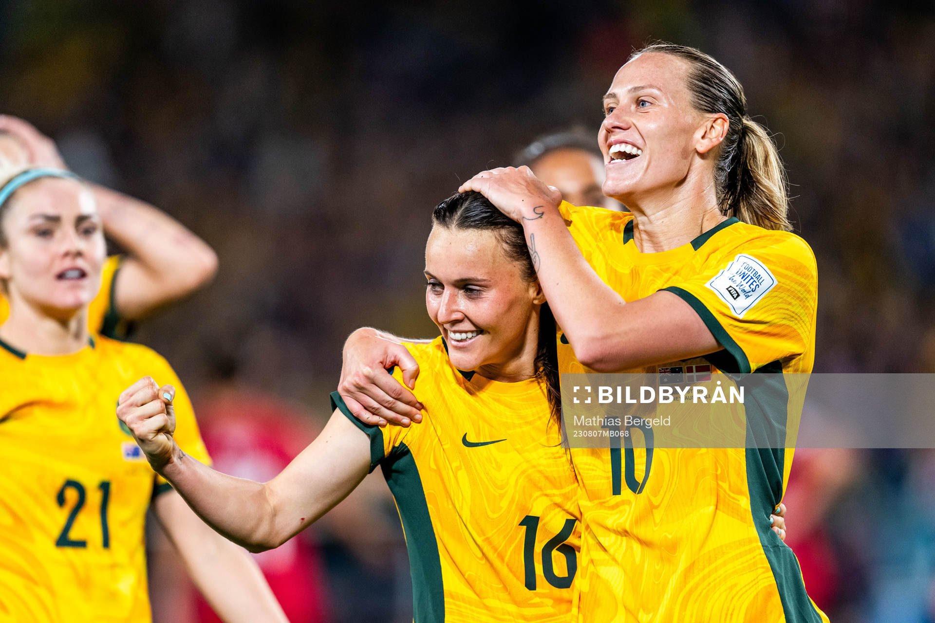 Hayley Raso and Emily van Egmond of Australia celebrates