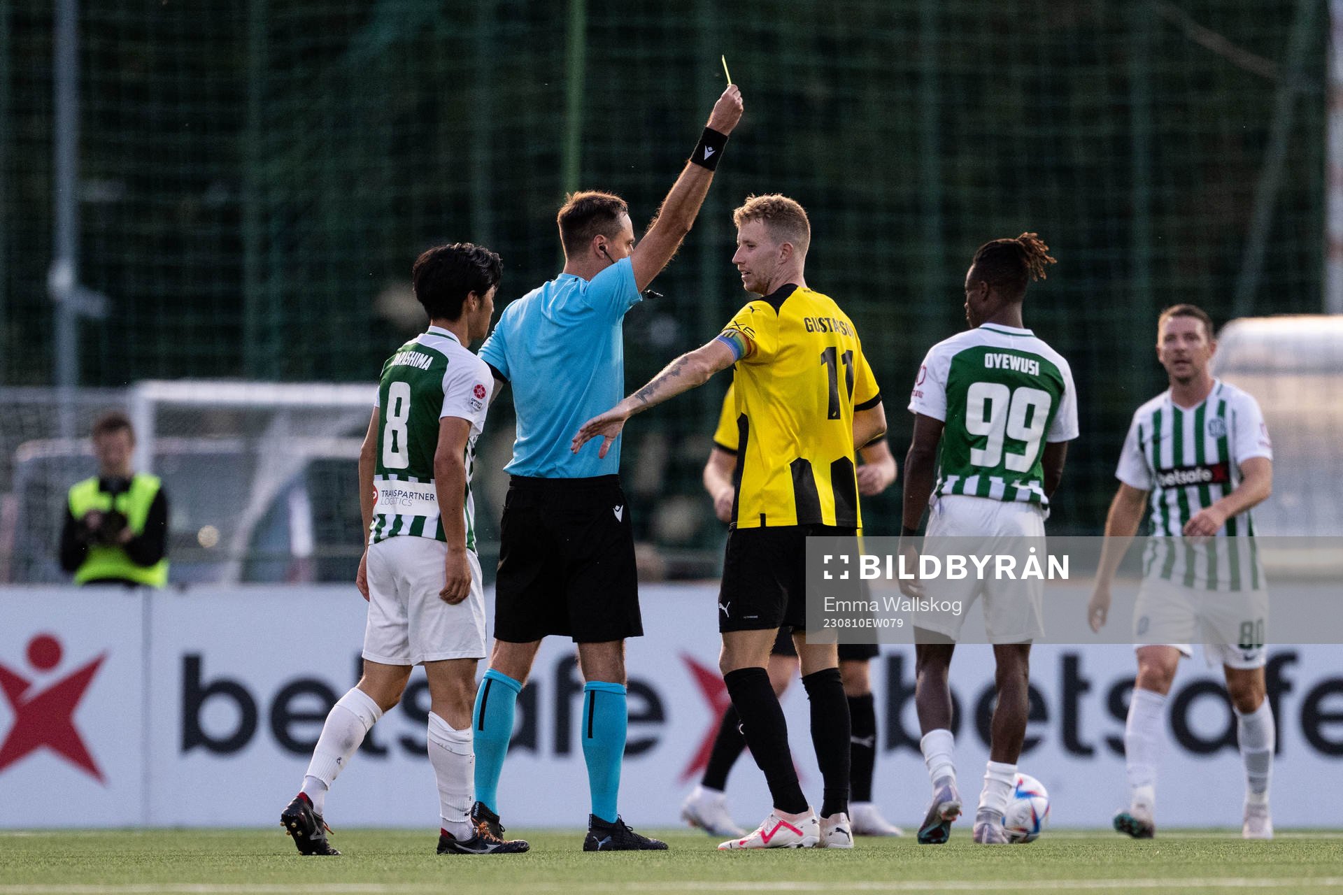 Samuel Gustafson of Häcken receives a yellow card from