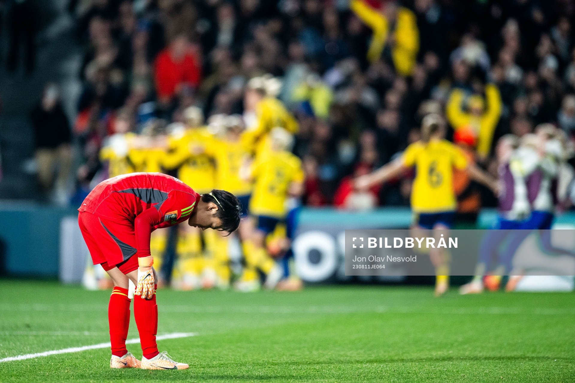 Goalkeeper Ayaka Yamashita of Japan looks dejected