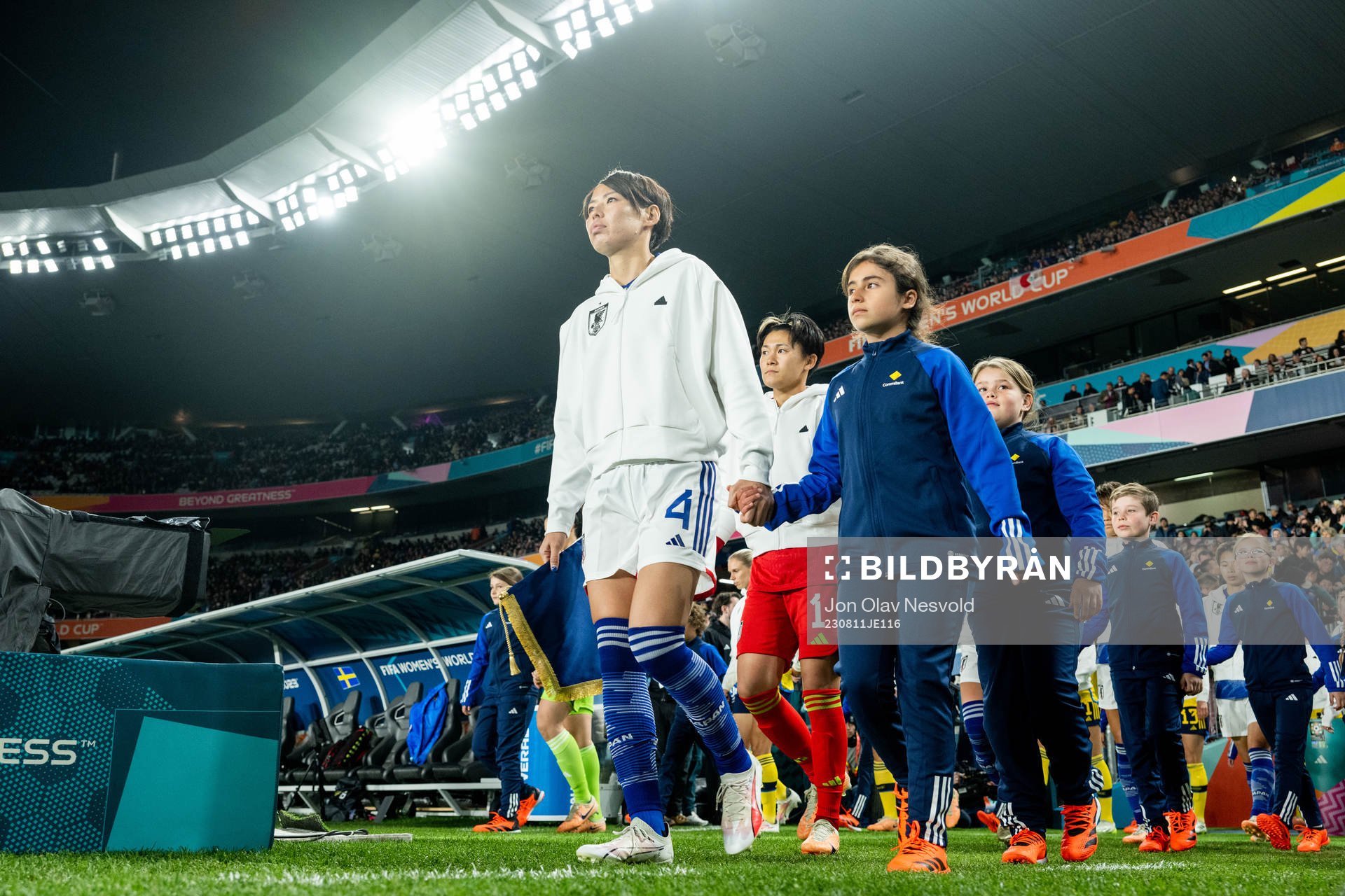 Saki Kumagai and goalkeeper Ayaka Yamashita of Japan