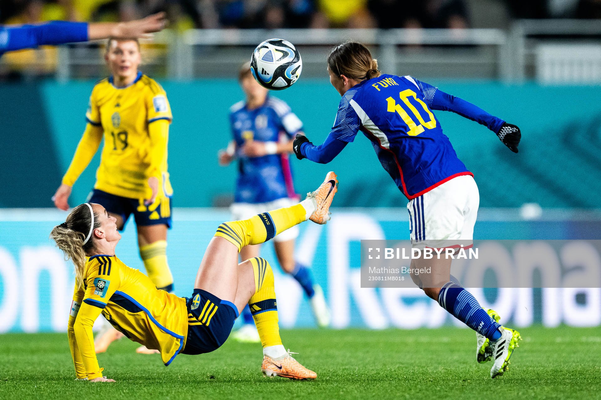 Kosovare Asllani of Sweden and Fuka Nagano of Japan