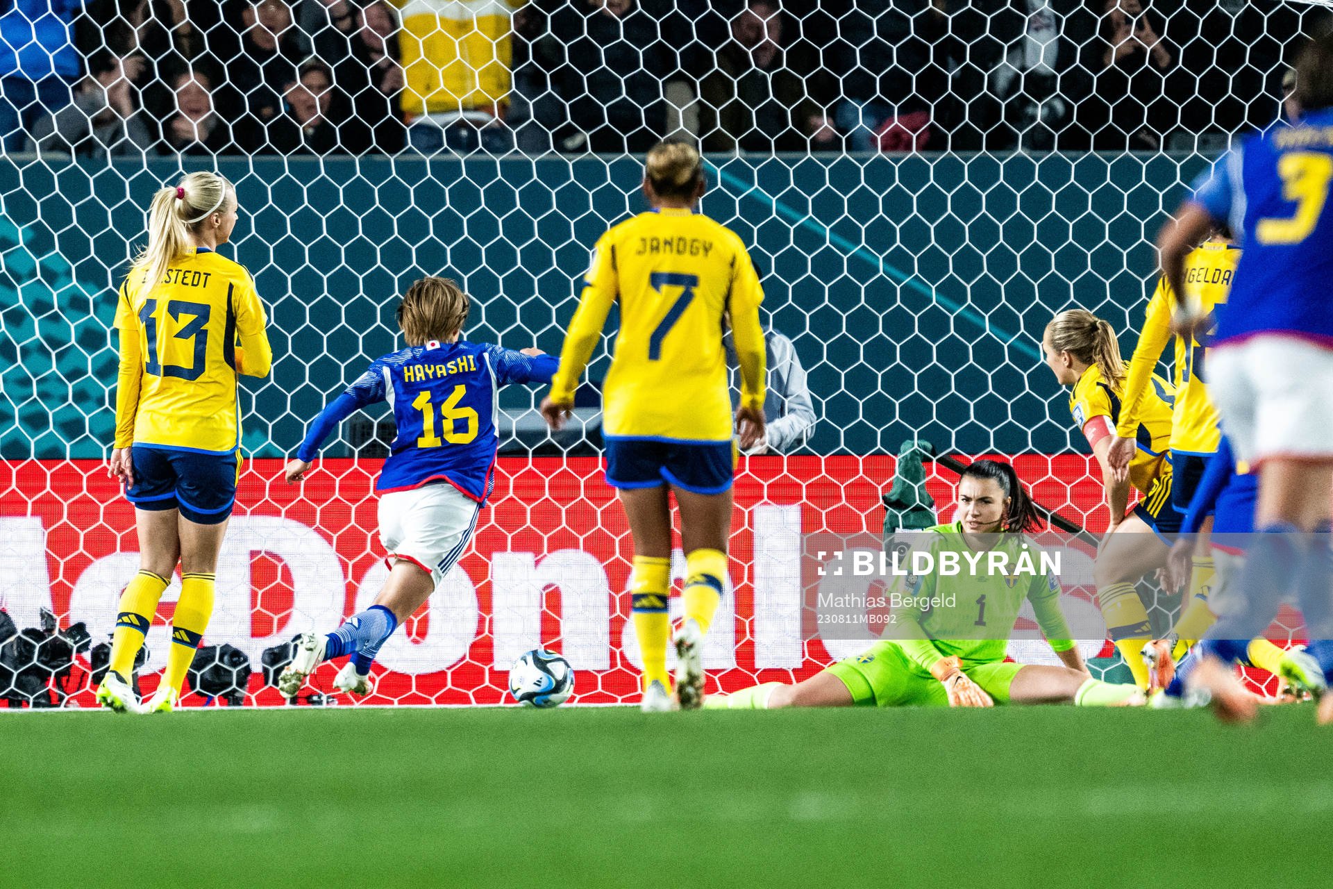 Honoka Hayashi of Japan celebrates and goalkeeper Zecira