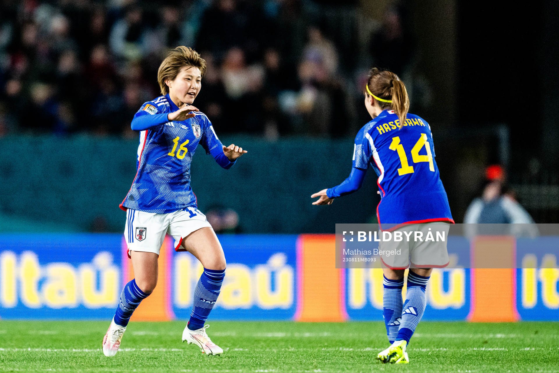 Honoka Hayashi and Yui Hasegawa of Japan celebrates