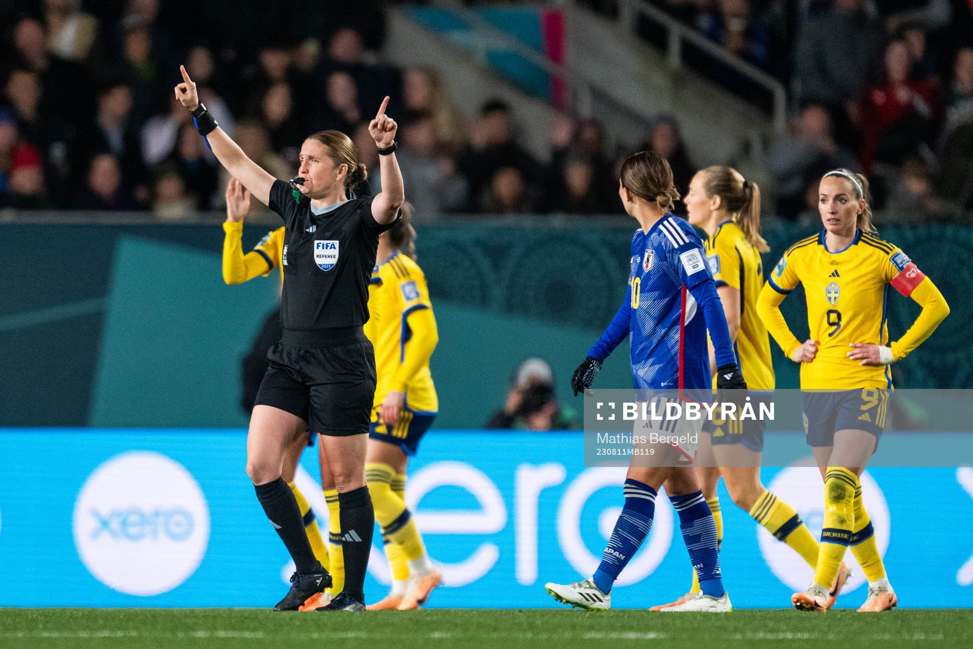 Referee Esther Staubli signals for VAR check and possible penalty for Sweden during the FIFA Women's World Cup quarterfinal between Japan and Sweden on August 11, 2023 in Auckland.