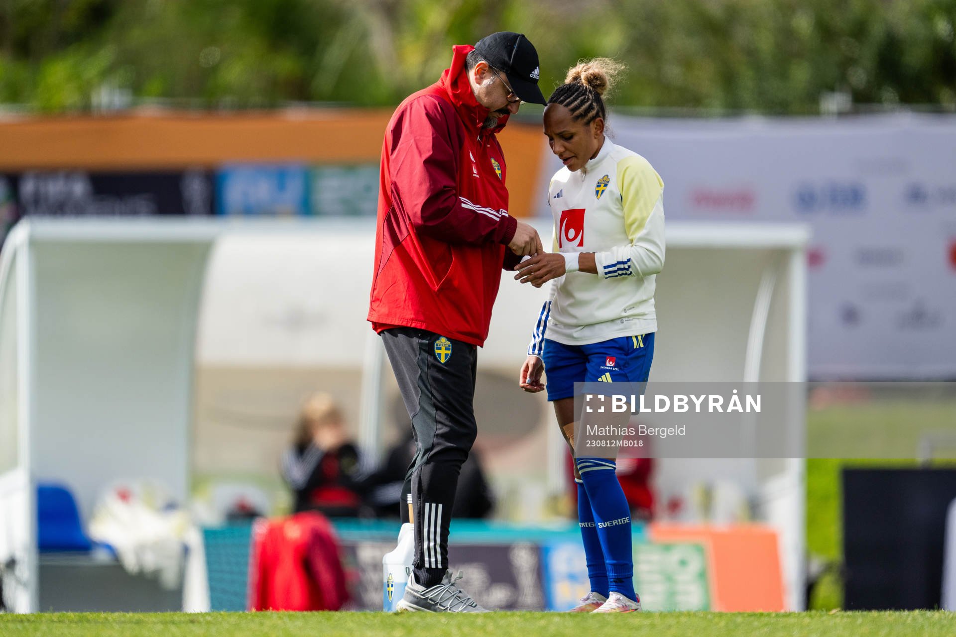 Medical doctor Houman Ebrahimi tends to Madelen Janogy of the Swedish women's national football team at a training session during the FIFA Women's World Cup on August 12, 2023 in Auckland.